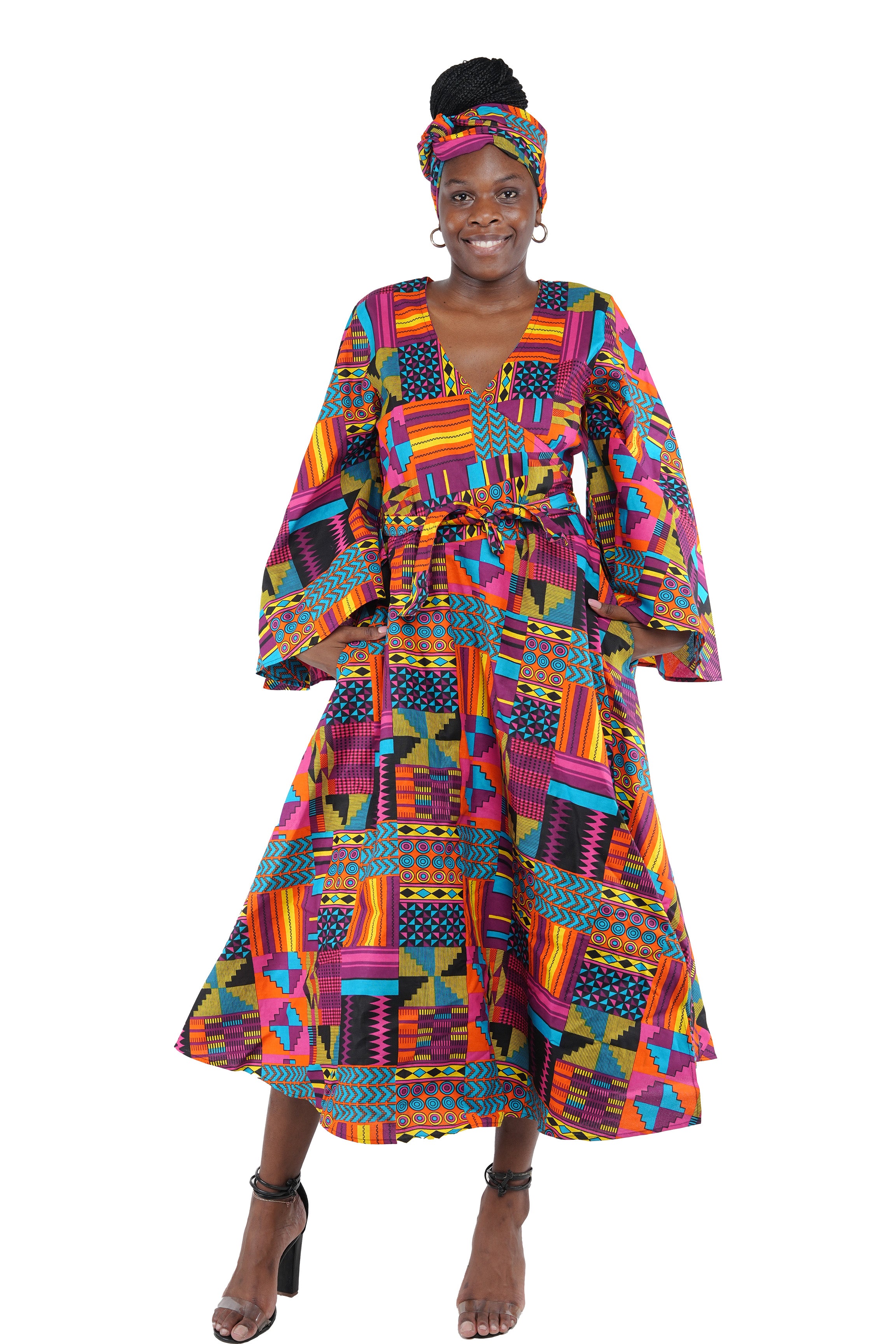 African long wrap dress with pockets and matching headwrap
Afrocentric cotton wrap dress with tribal print
African attire for women – ankara wrap dress
African dresses for women