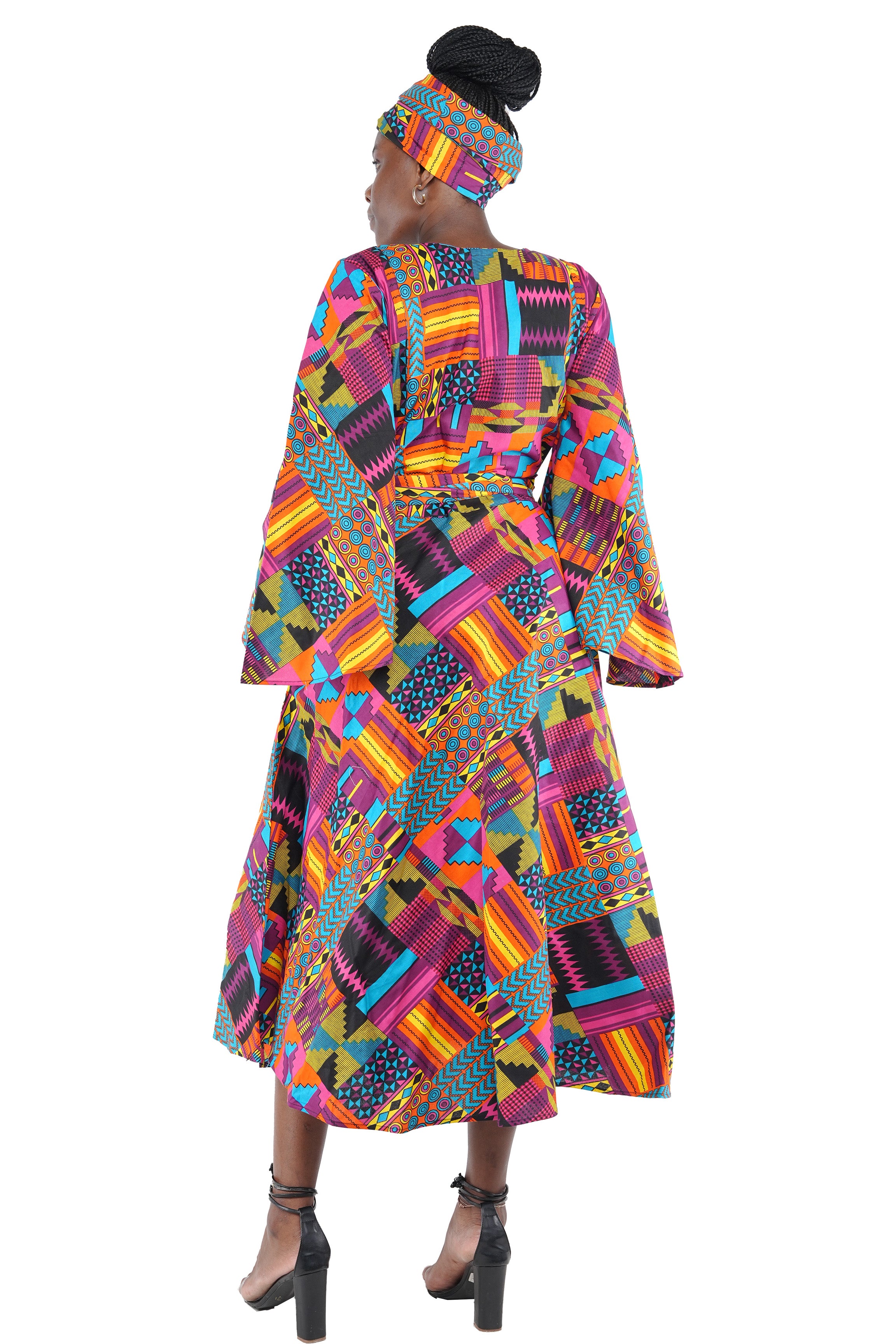 African long wrap dress with pockets and matching headwrap
Afrocentric cotton wrap dress with tribal print
African attire for women – ankara wrap dress
African dresses for women