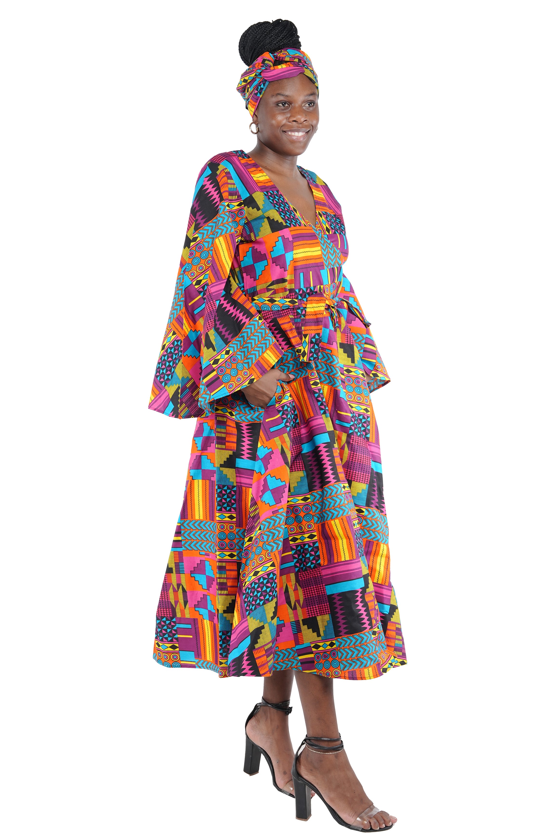 African long wrap dress with pockets and matching headwrap
Afrocentric cotton wrap dress with tribal print
African attire for women – ankara wrap dress
African dresses for women