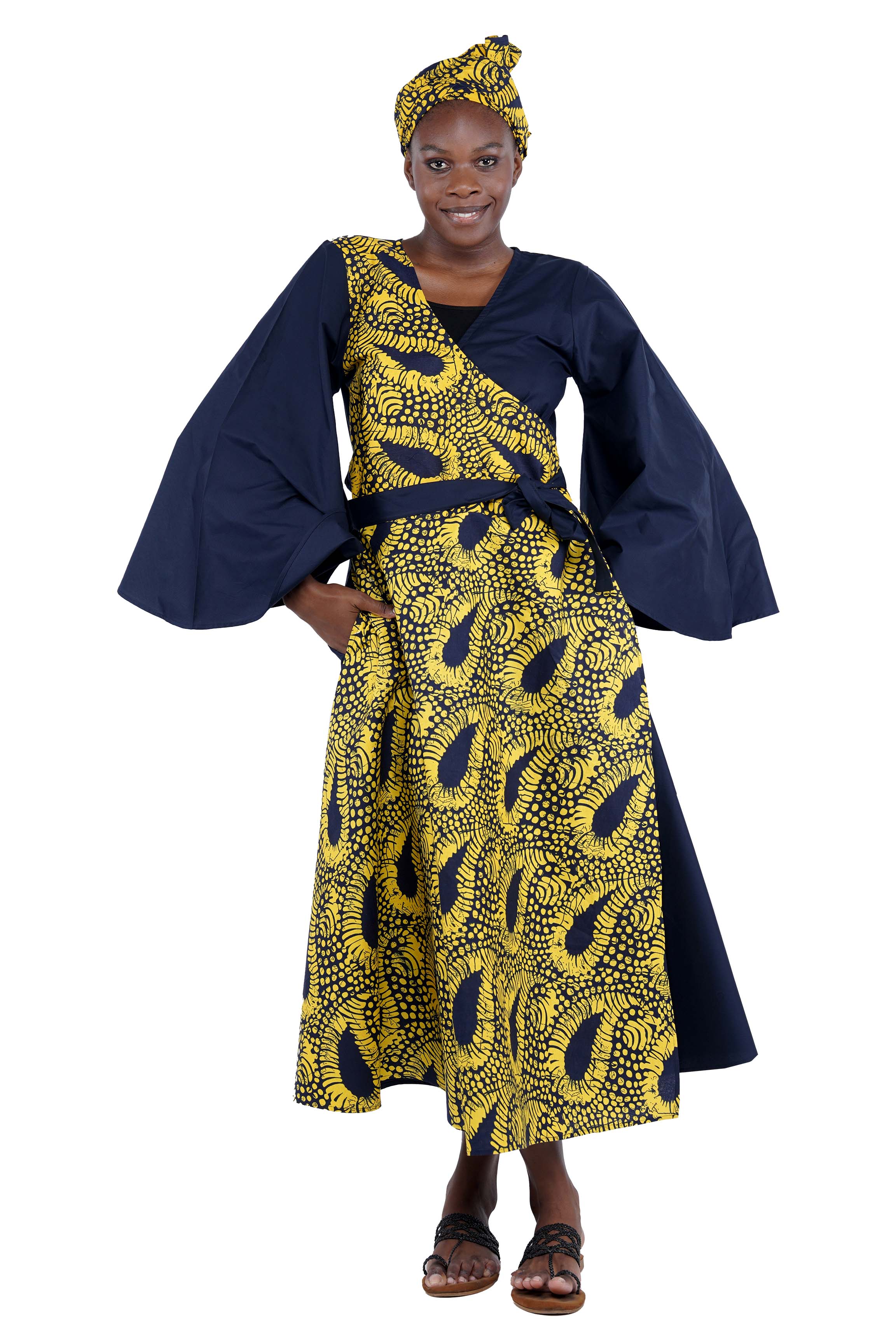 African long wrap dress with pockets and matching headwrap
Afrocentric cotton wrap dress with tribal print
African attire for women – ankara wrap dress
African dresses for women