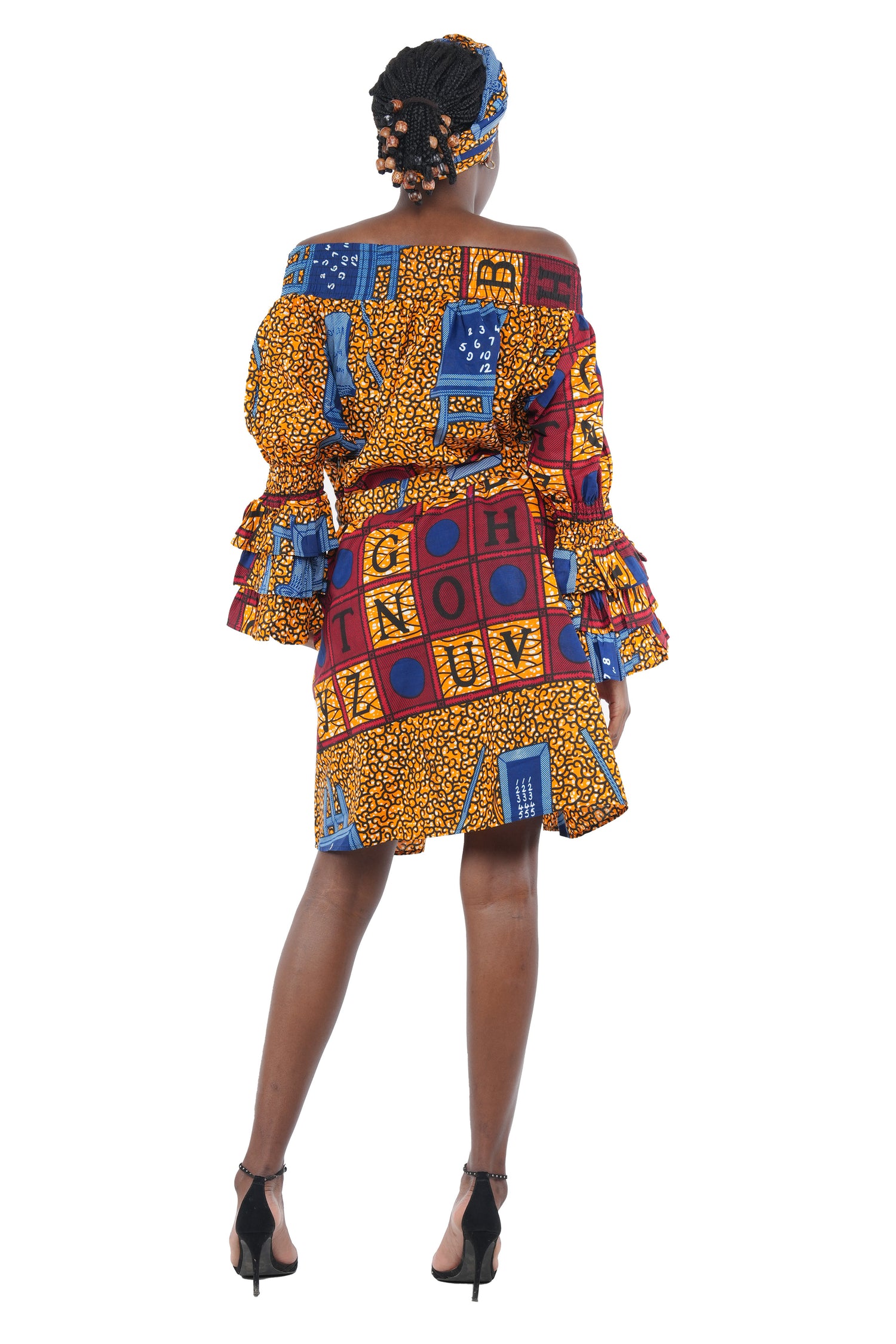 African off-the-shoulder midi dress with belt and headwrap
Afrocentric cotton midi dress with pockets
African attire for women – tribal print midi dress
African dresses for women