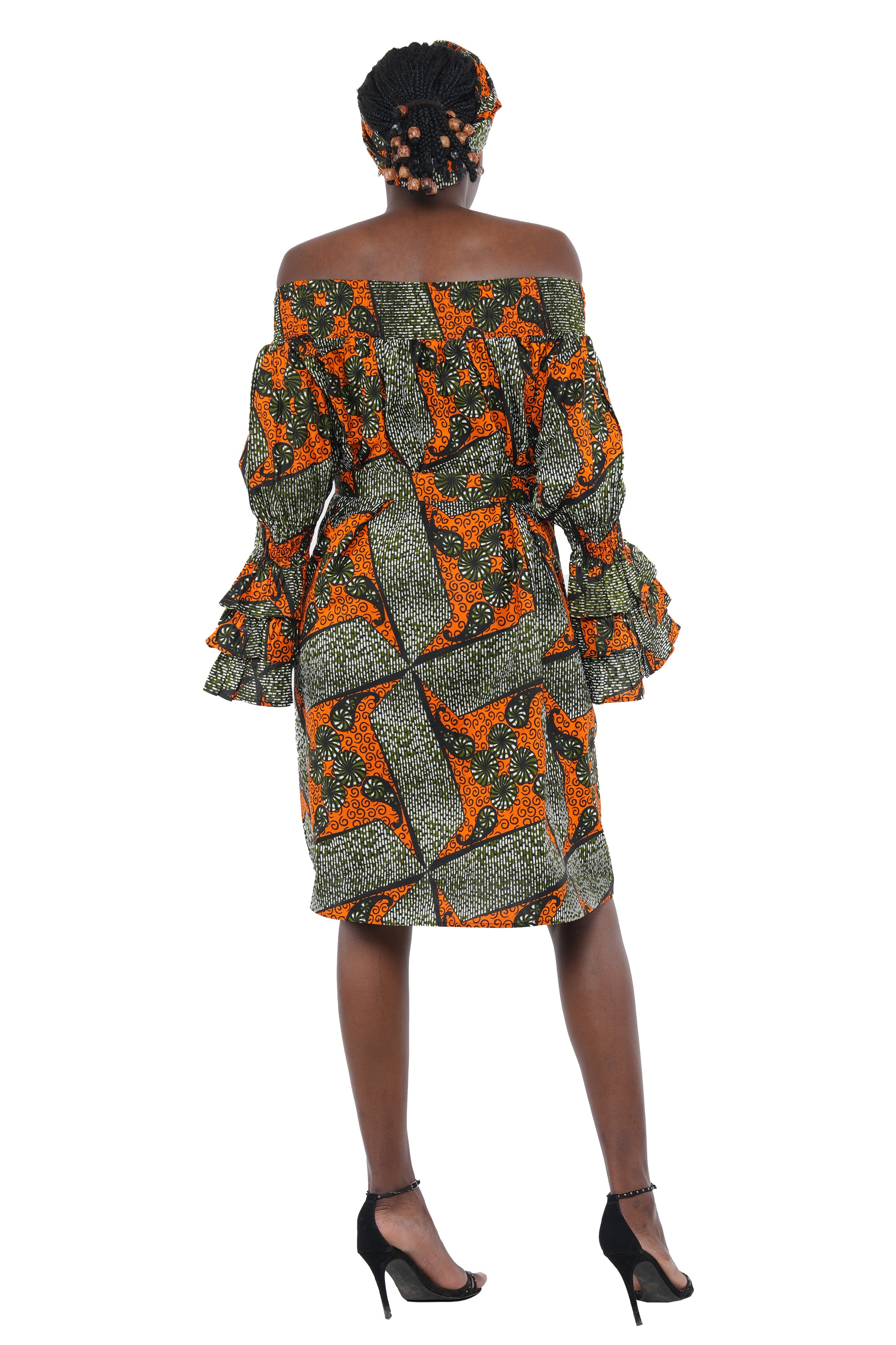 African off-the-shoulder midi dress with belt and headwrap
Afrocentric cotton midi dress with pockets
African attire for women – tribal print midi dress
African dresses for women