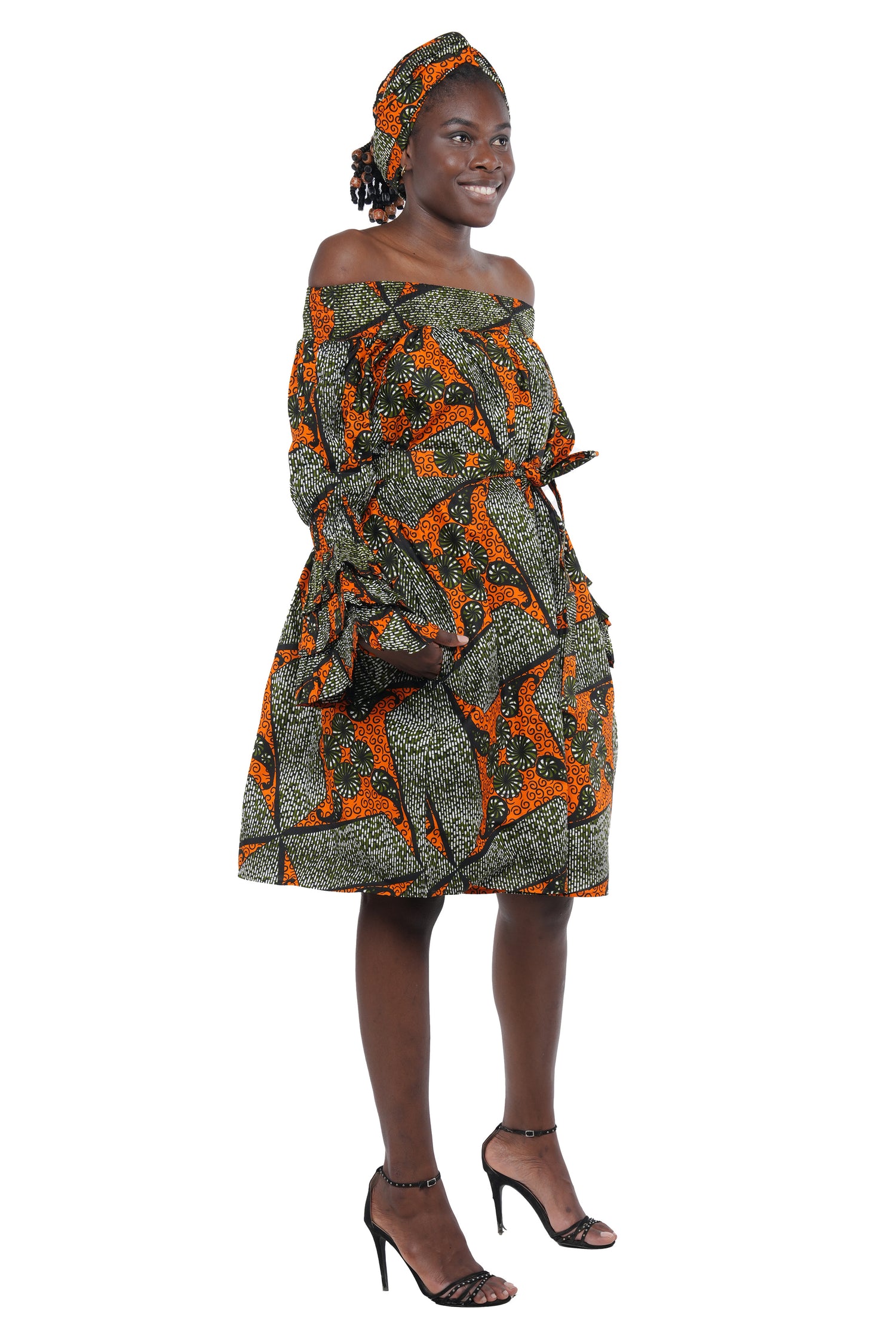 African off-the-shoulder midi dress with belt and headwrap
Afrocentric cotton midi dress with pockets
African attire for women – tribal print midi dress
African dresses for women