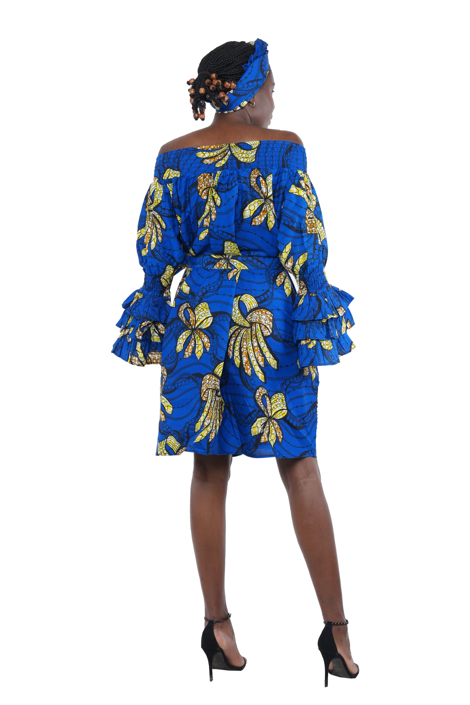 African off-the-shoulder midi dress with belt and headwrap
Afrocentric cotton midi dress with pockets
African attire for women – tribal print midi dress
African dresses for women