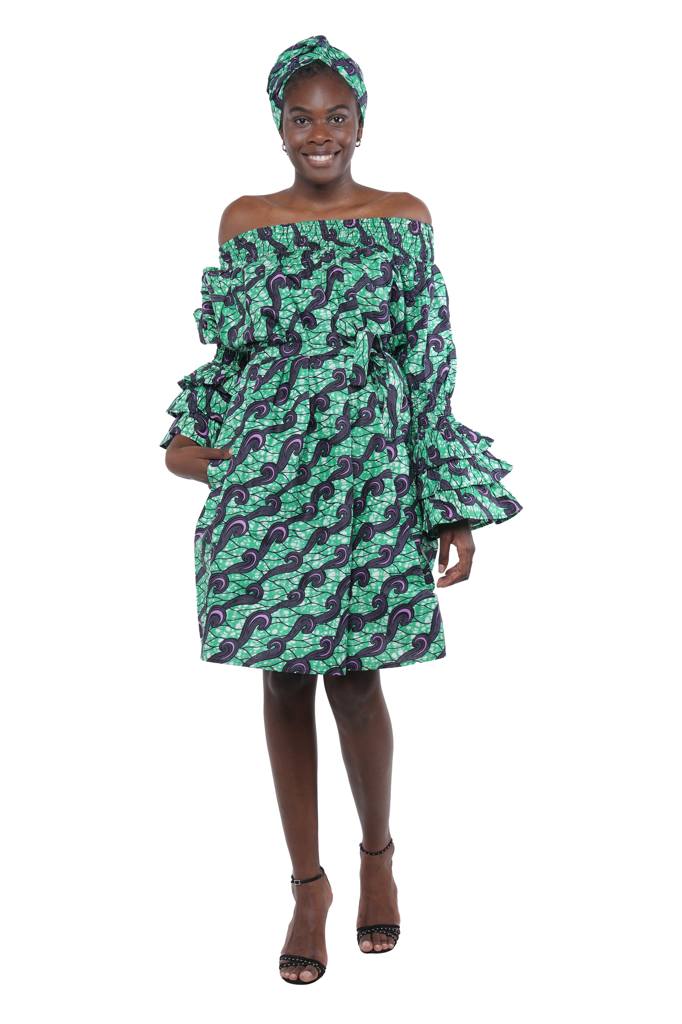 African off-the-shoulder midi dress with belt and headwrap
Afrocentric cotton midi dress with pockets
African attire for women – tribal print midi dress
African dresses for women