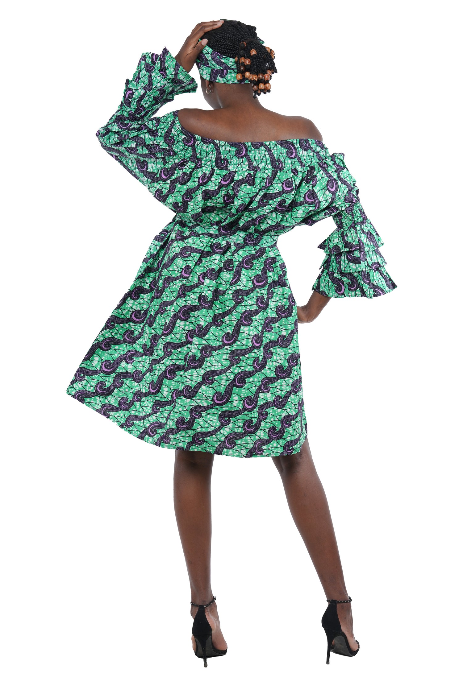 African off-the-shoulder midi dress with belt and headwrap
Afrocentric cotton midi dress with pockets
African attire for women – tribal print midi dress
African dresses for women