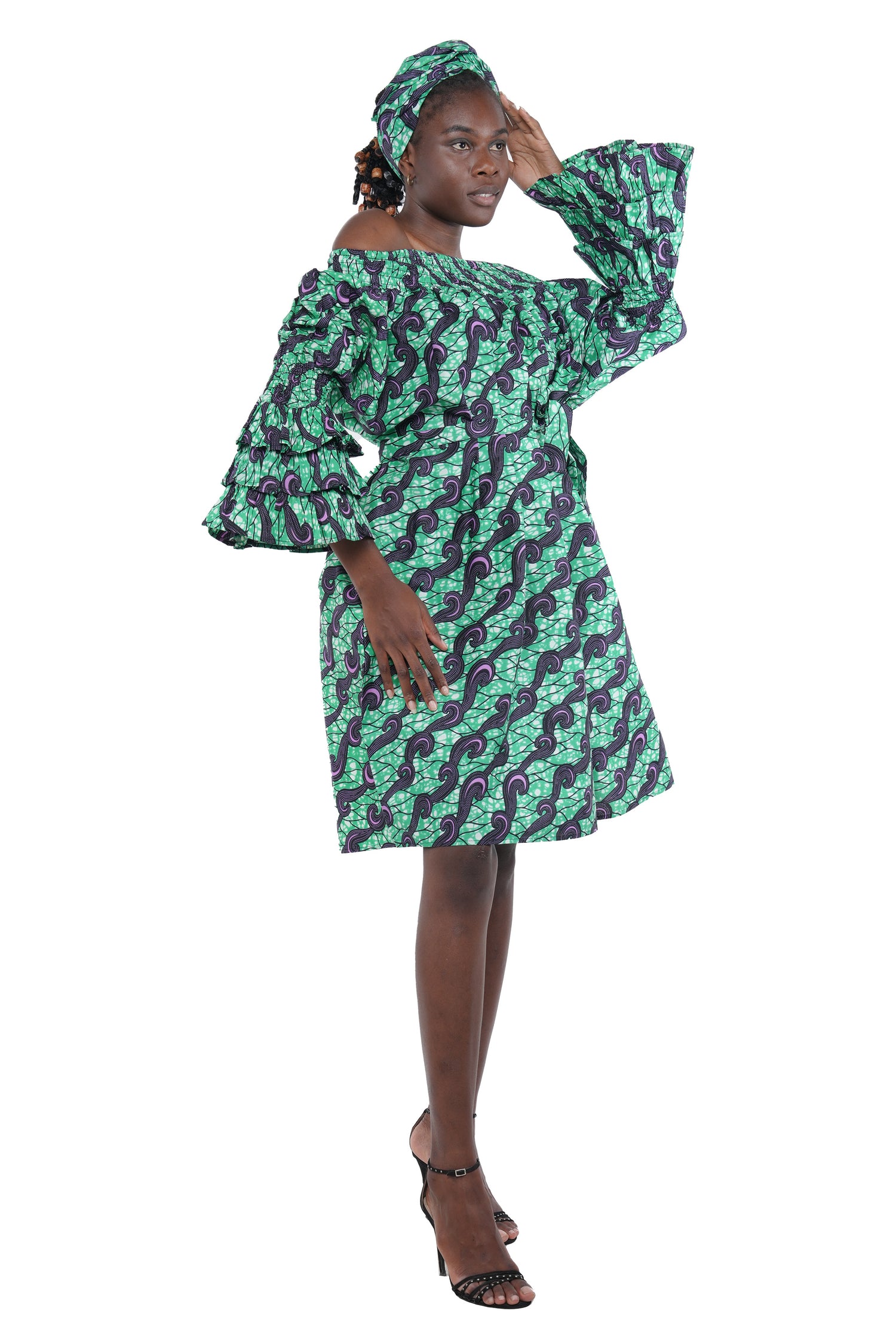 African off-the-shoulder midi dress with belt and headwrap
Afrocentric cotton midi dress with pockets
African attire for women – tribal print midi dress
African dresses for women