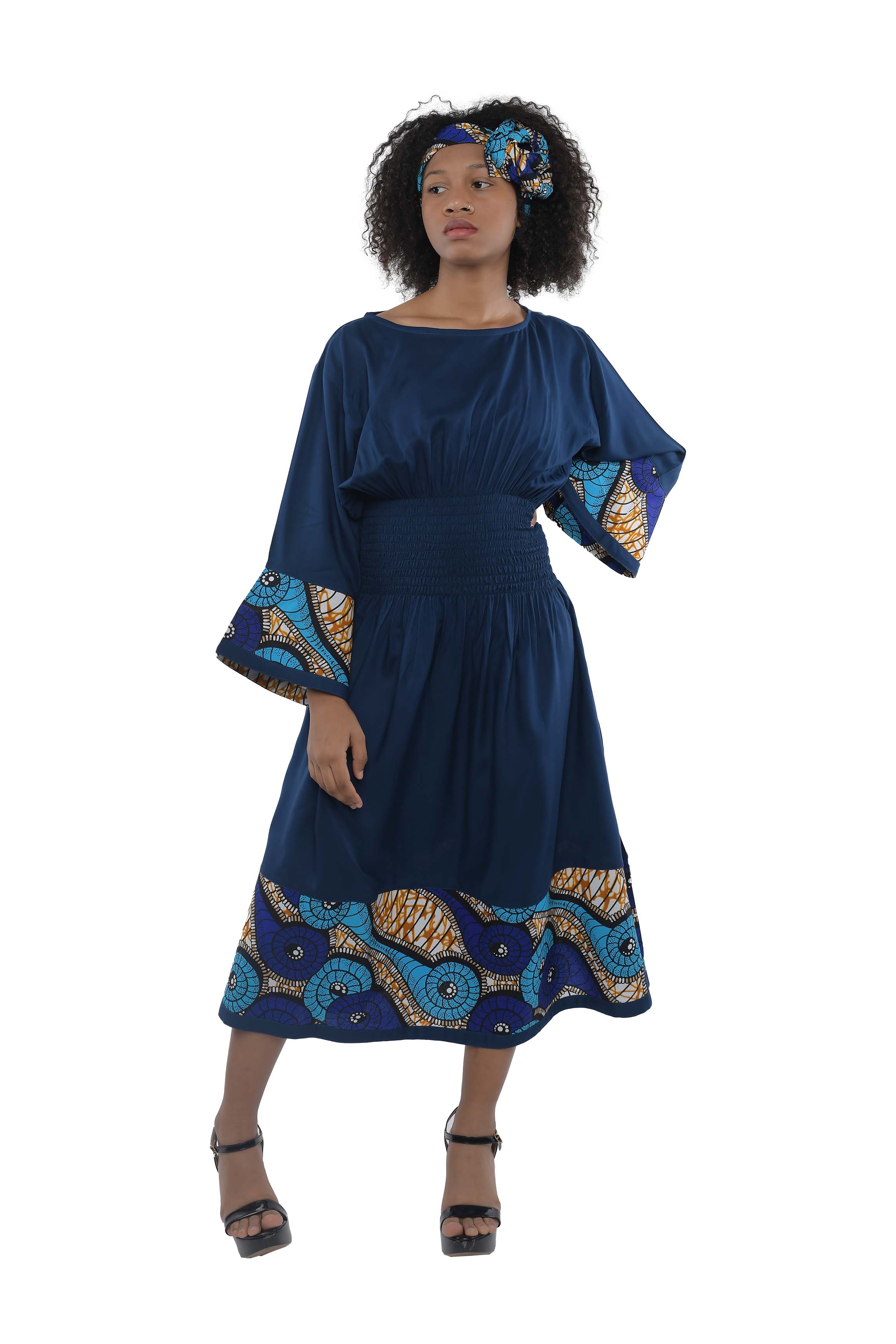 African trim midi dress in solid color with patchwork detail
Afrocentric rayon dress with smocked waist and headwrap
African print patchwork midi dress with pockets
African dresses for women