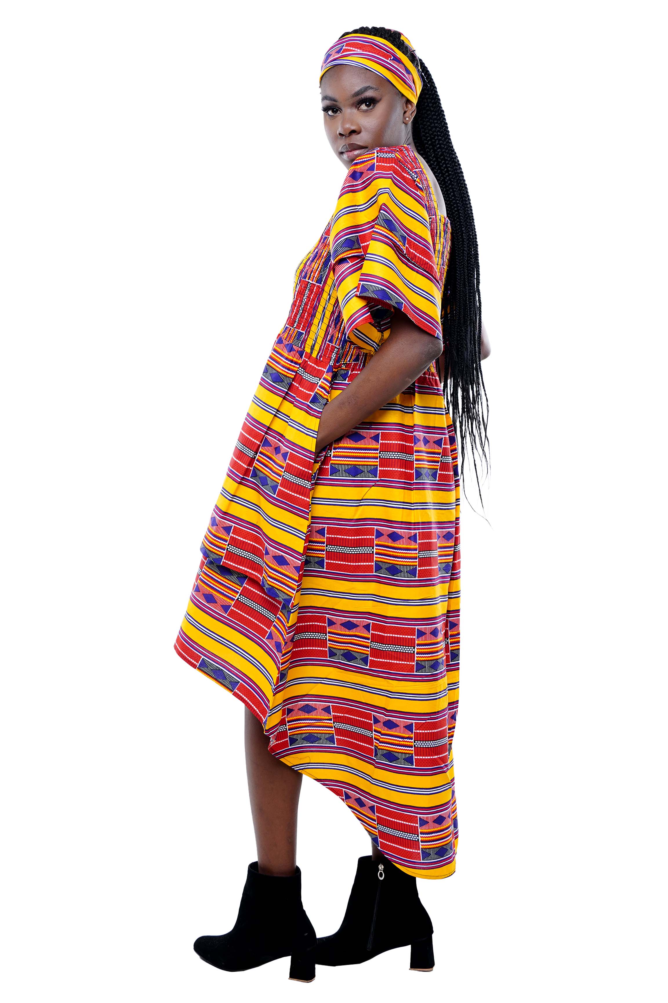 African smocked high low dress with headwrap and pockets
Afrocentric cotton dress with double layer hem and V neckline
High low African dress one size fits most
African dresses for women