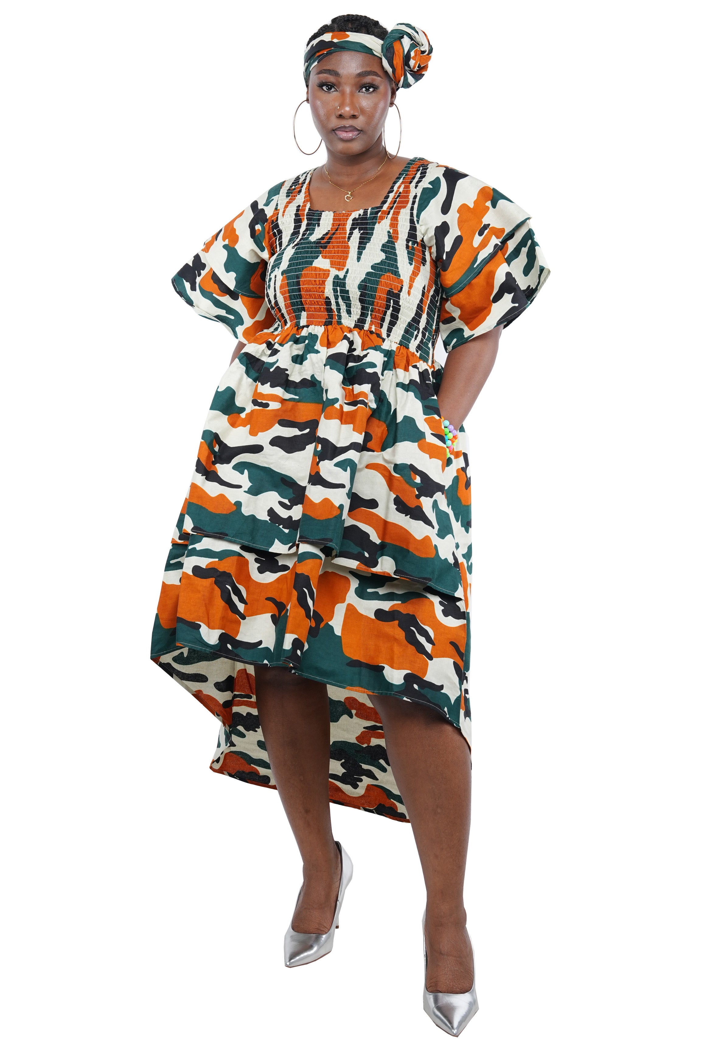 African smocked high low dress with headwrap and pockets
Afrocentric cotton dress with double layer hem and V neckline
High low African dress one size fits most
African dresses for women