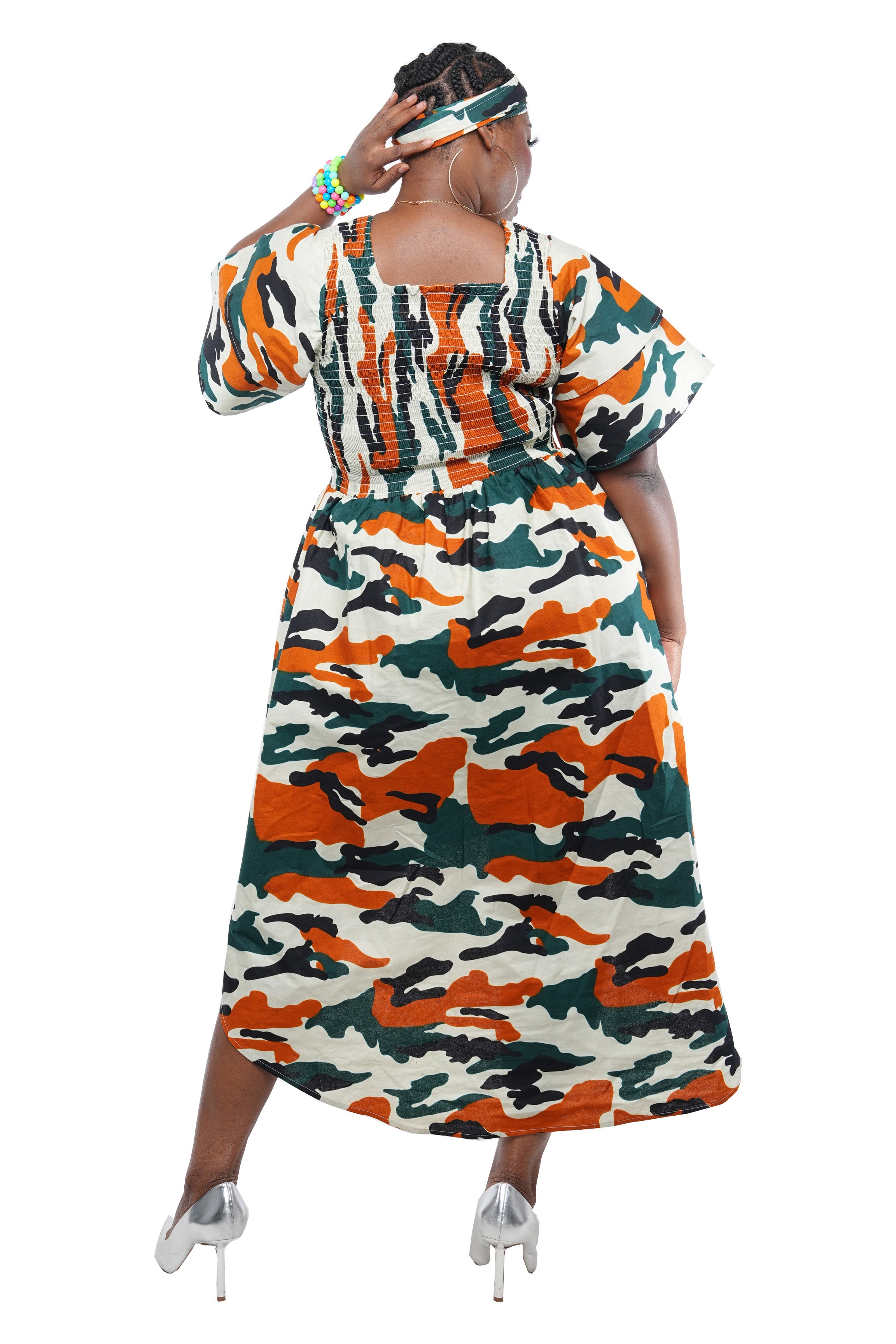 African smocked high low dress with headwrap and pockets
Afrocentric cotton dress with double layer hem and V neckline
High low African dress one size fits most
African dresses for women