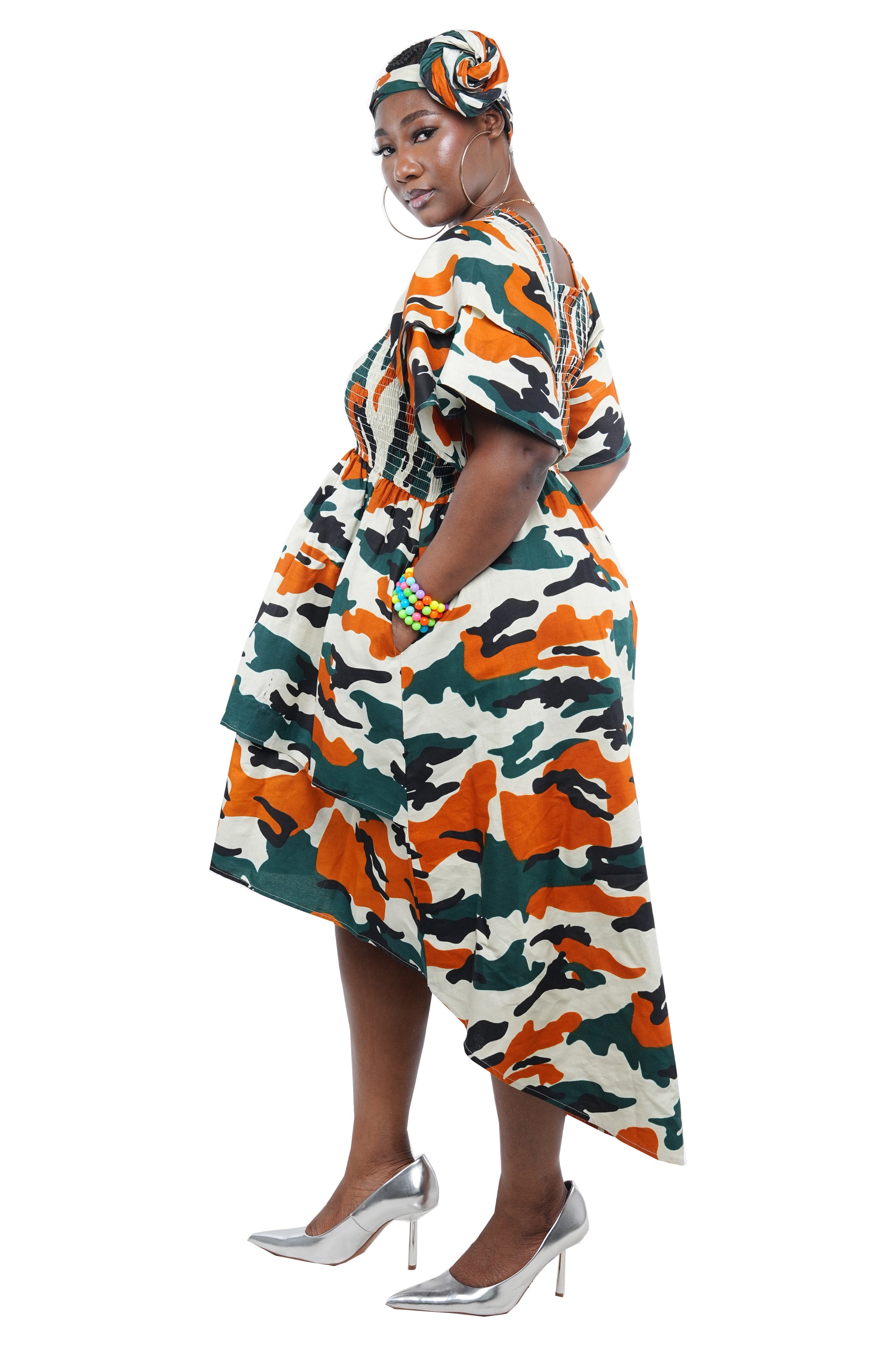 African smocked high low dress with headwrap and pockets
Afrocentric cotton dress with double layer hem and V neckline
High low African dress one size fits most
African dresses for women