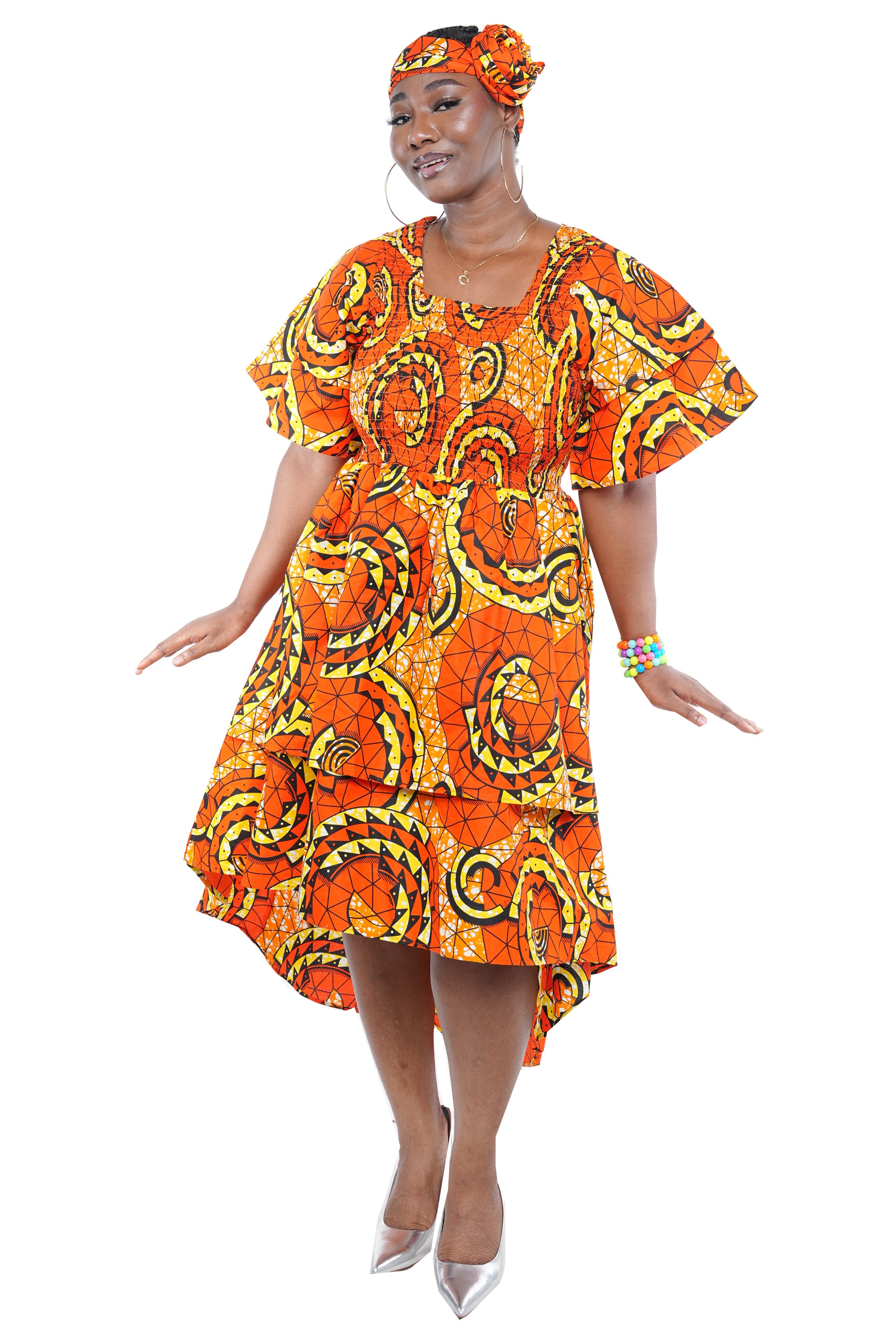 African smocked high low dress with headwrap and pockets
Afrocentric cotton dress with double layer hem and V neckline
High low African dress one size fits most
African dresses for women