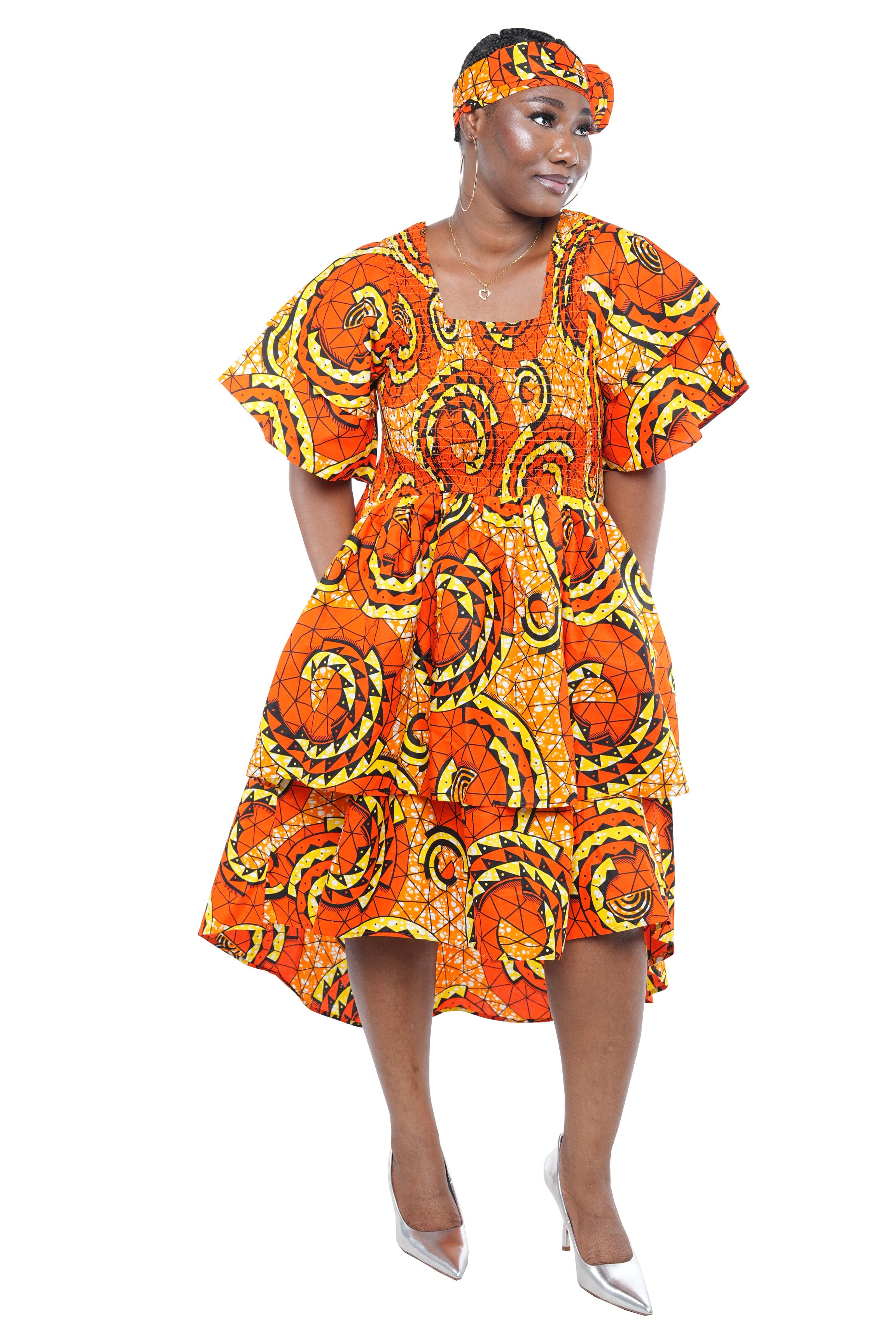 African smocked high low dress with headwrap and pockets
Afrocentric cotton dress with double layer hem and V neckline
High low African dress one size fits most
African dresses for women
