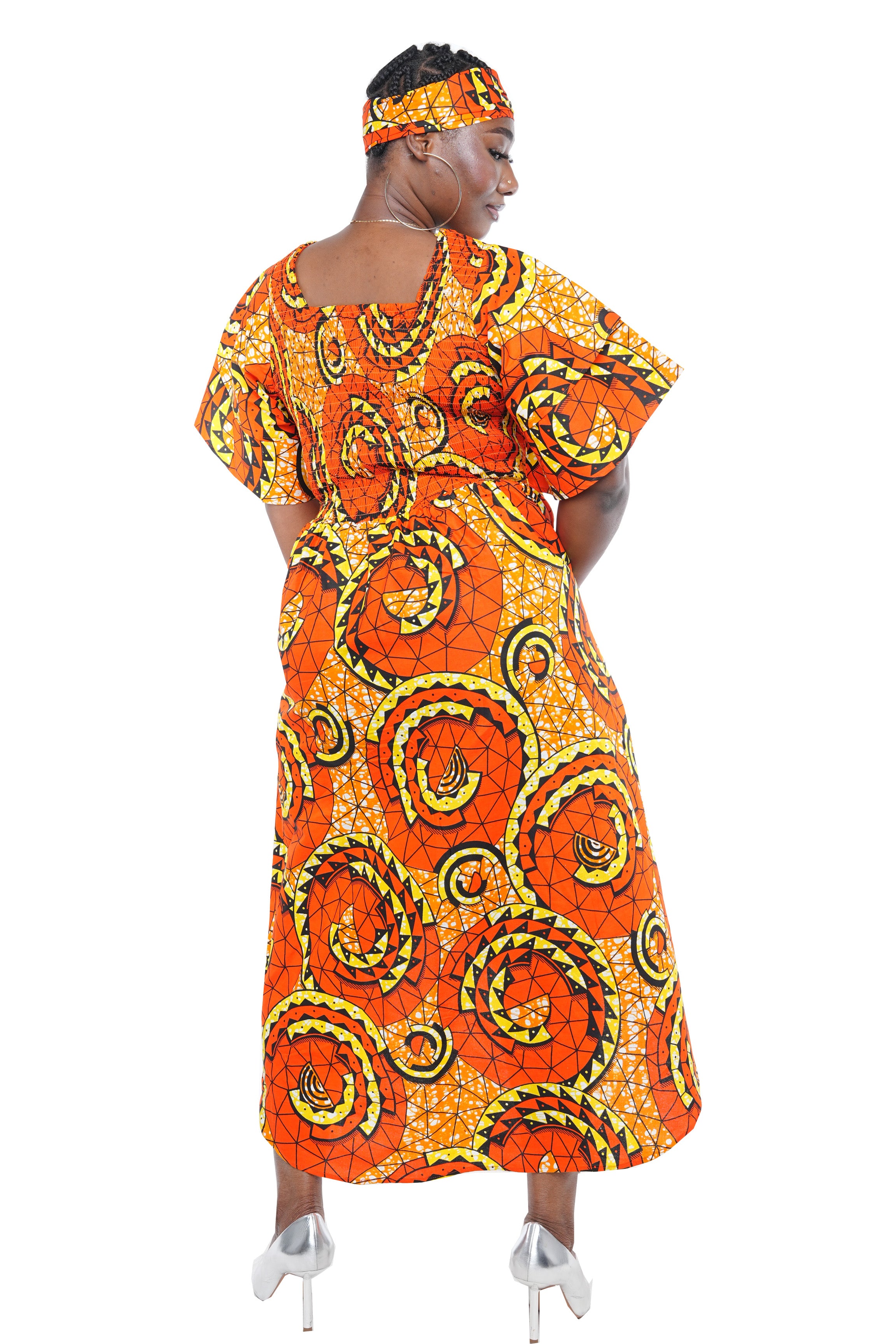 African smocked high low dress with headwrap and pockets
Afrocentric cotton dress with double layer hem and V neckline
High low African dress one size fits most
African dresses for women