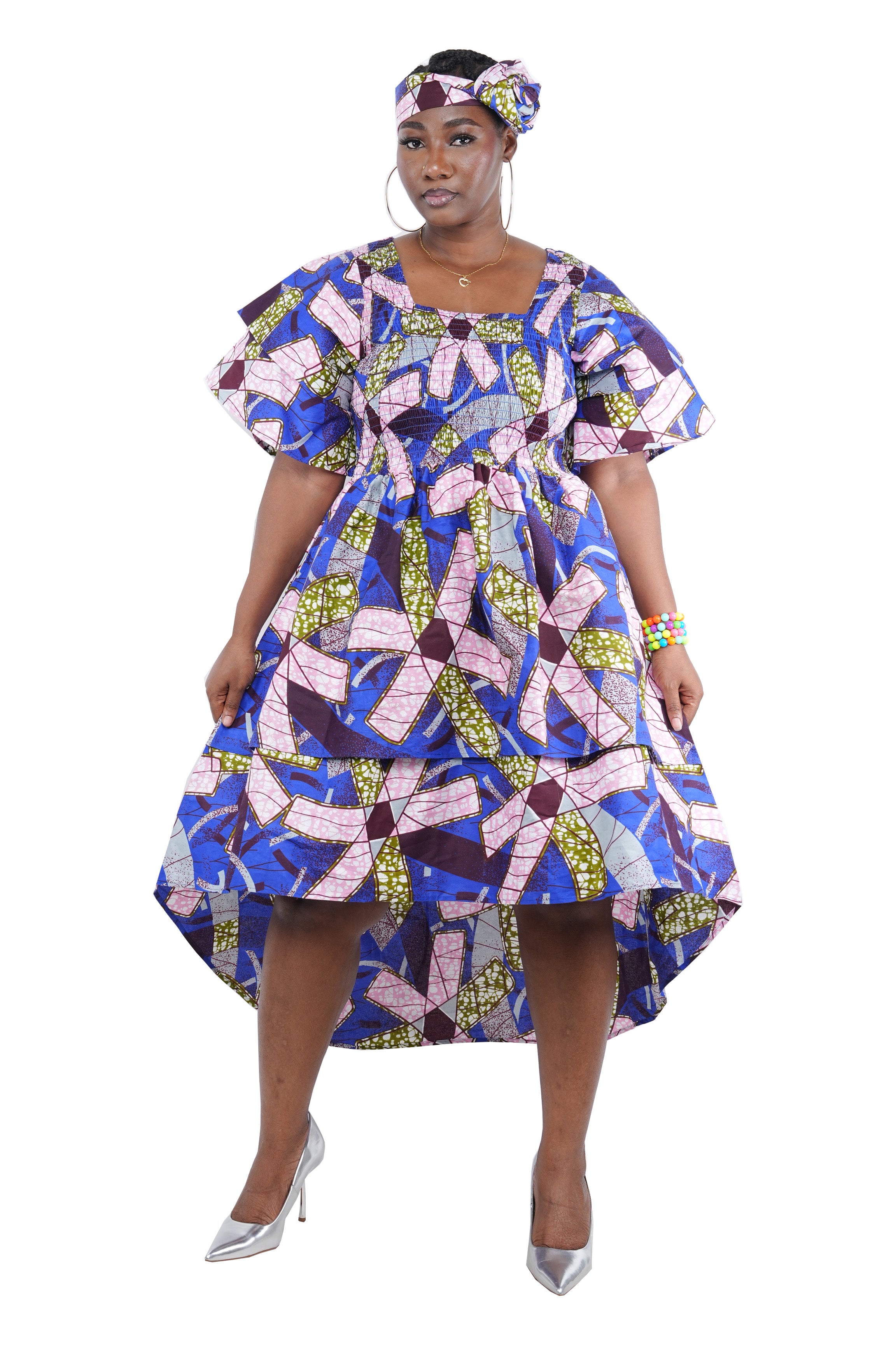 African smocked high low dress with headwrap and pockets
Afrocentric cotton dress with double layer hem and V neckline
High low African dress one size fits most
African dresses for women