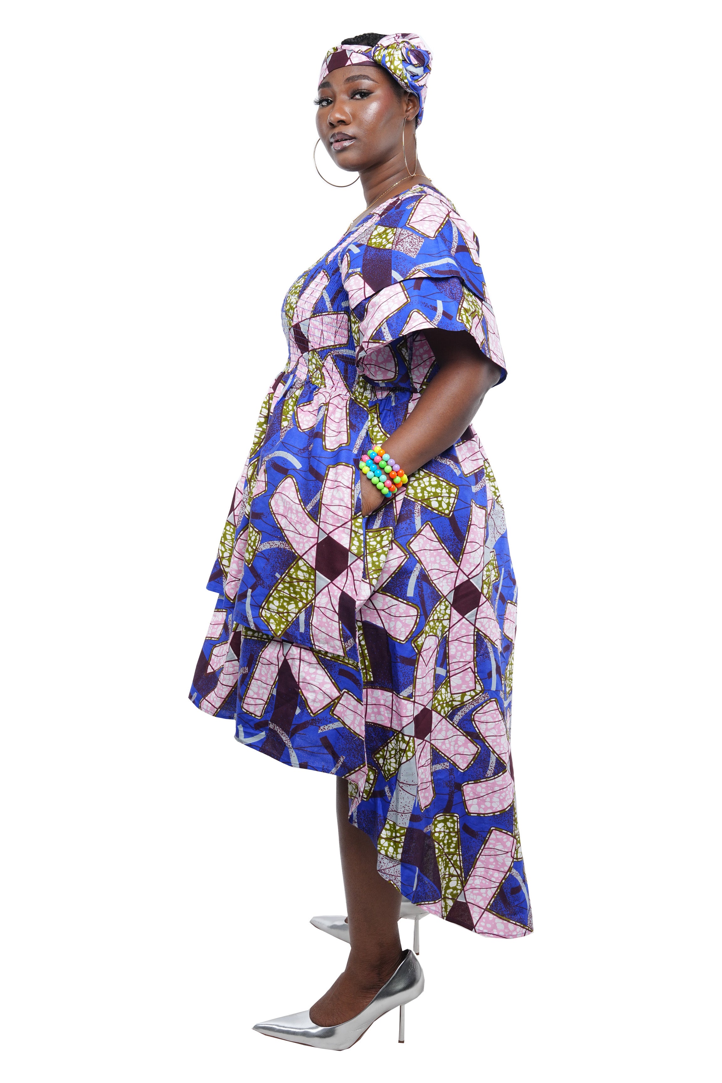 African smocked high low dress with headwrap and pockets
Afrocentric cotton dress with double layer hem and V neckline
High low African dress one size fits most
African dresses for women