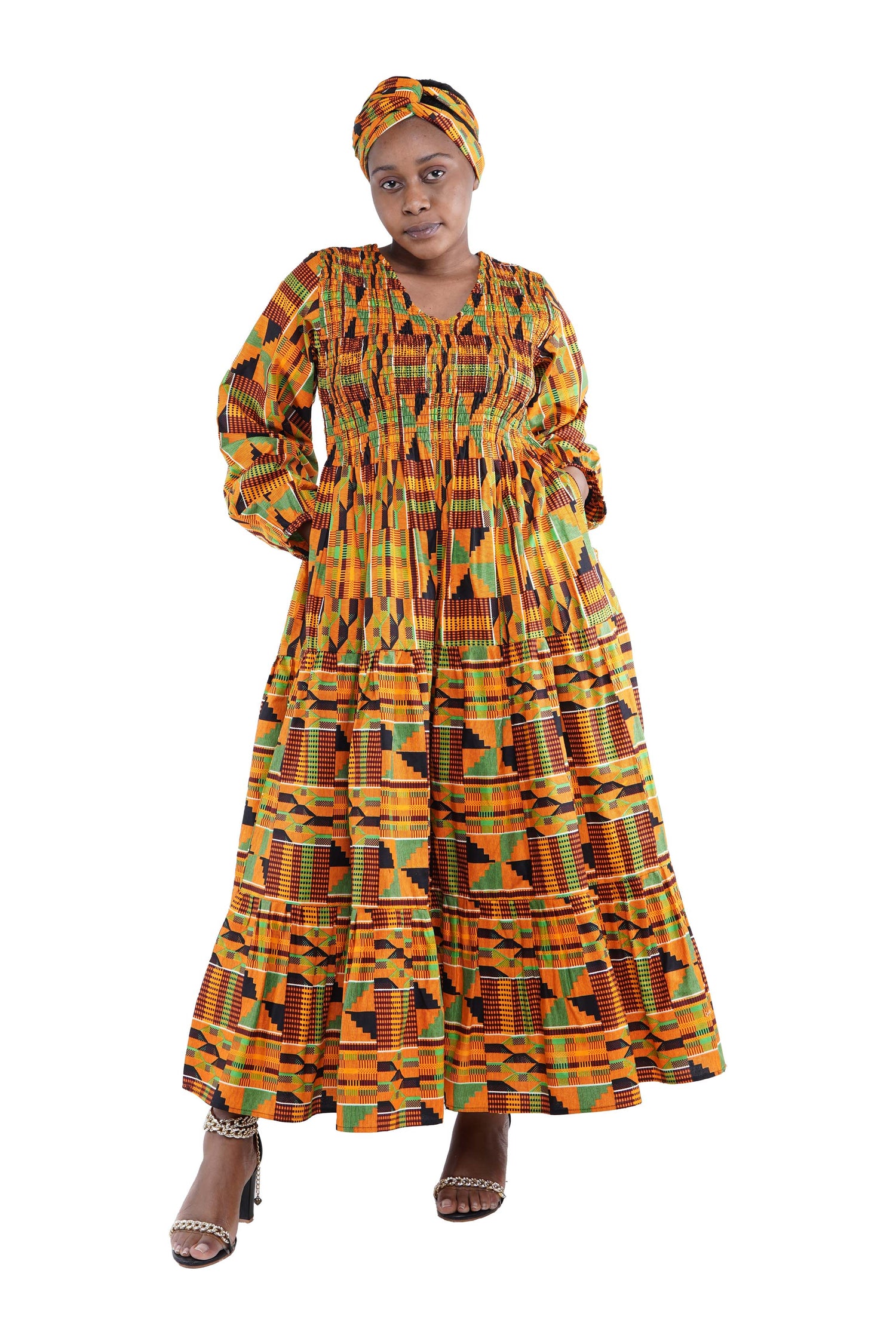 African smocked maxi tiered dress with long sleeves and headwrap
Cotton V-neck African maxi dress with pockets
Afrocentric long sleeve tiered dress one size fits most
African dresses for women