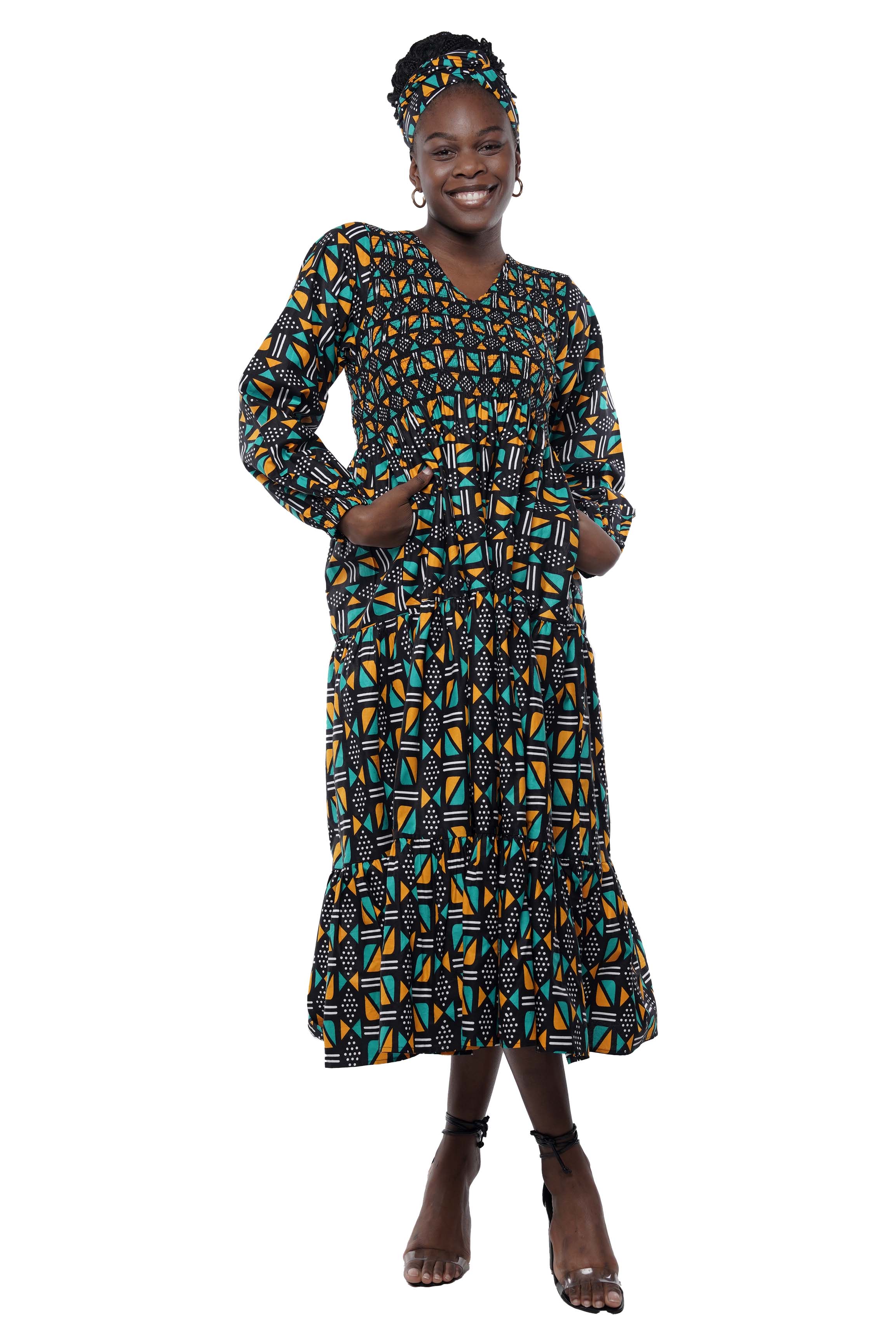 African smocked maxi tiered dress with long sleeves and headwrap
Cotton V-neck African maxi dress with pockets
Afrocentric long sleeve tiered dress one size fits most
African dresses for women