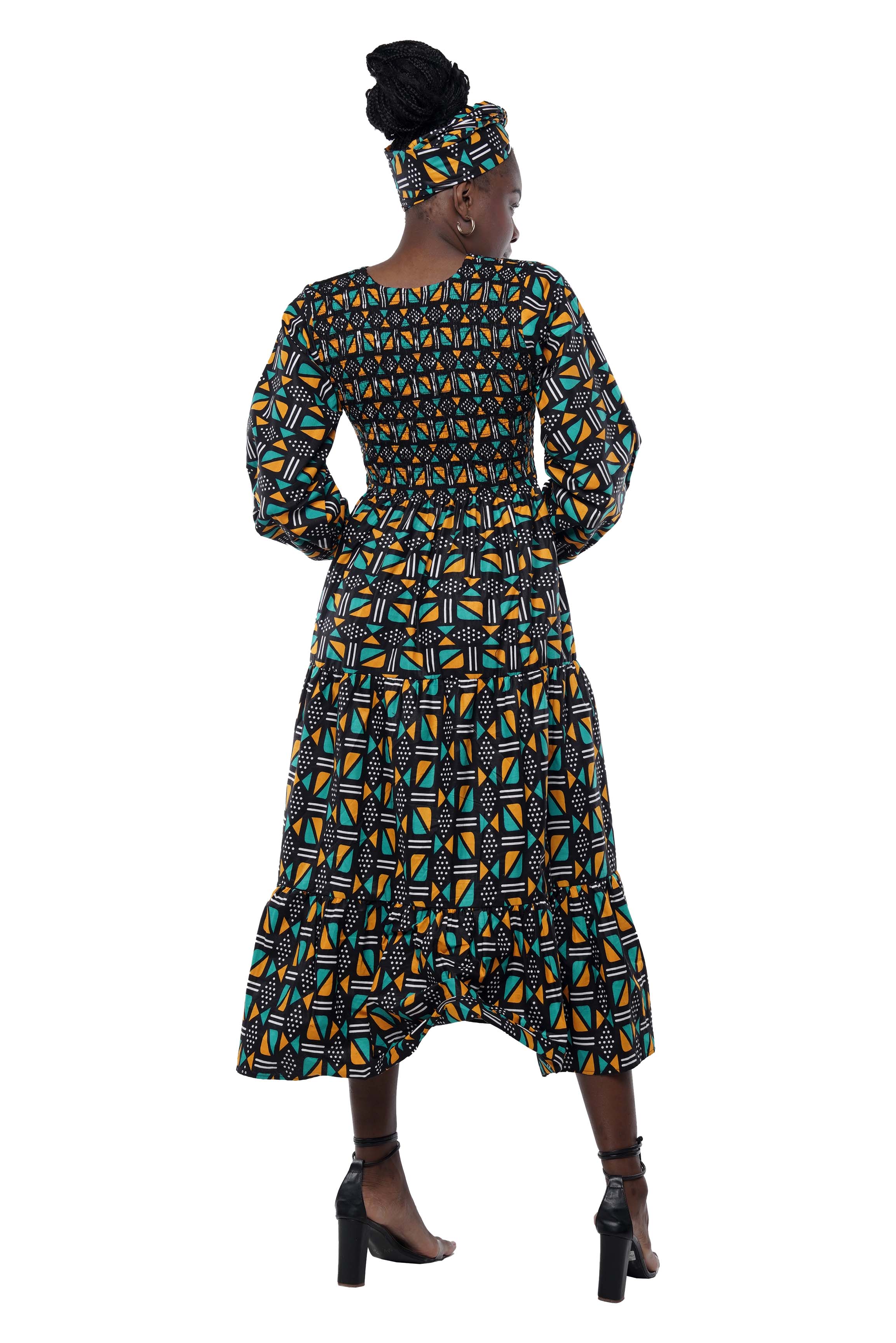 African smocked maxi tiered dress with long sleeves and headwrap
Cotton V-neck African maxi dress with pockets
Afrocentric long sleeve tiered dress one size fits most
African dresses for women