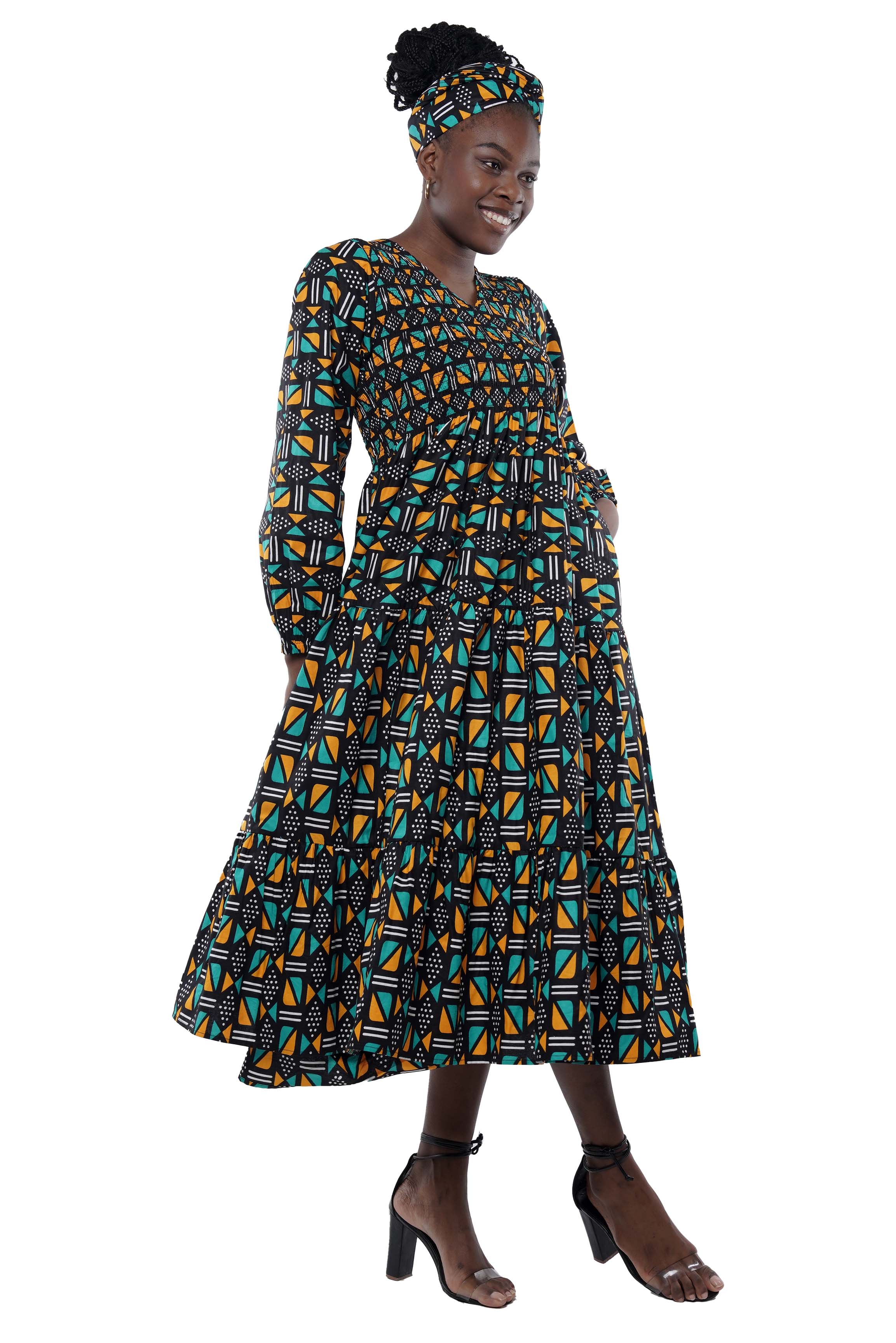 African smocked maxi tiered dress with long sleeves and headwrap
Cotton V-neck African maxi dress with pockets
Afrocentric long sleeve tiered dress one size fits most
African dresses for women