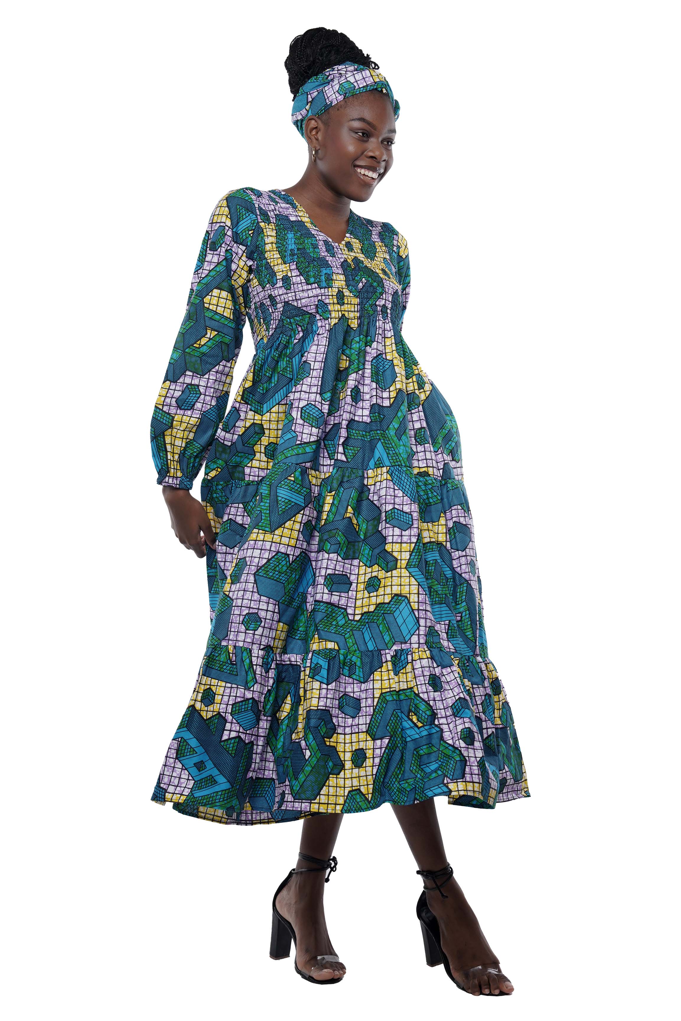 African smocked maxi tiered dress with long sleeves and headwrap
Cotton V-neck African maxi dress with pockets
Afrocentric long sleeve tiered dress one size fits most
African dresses for women