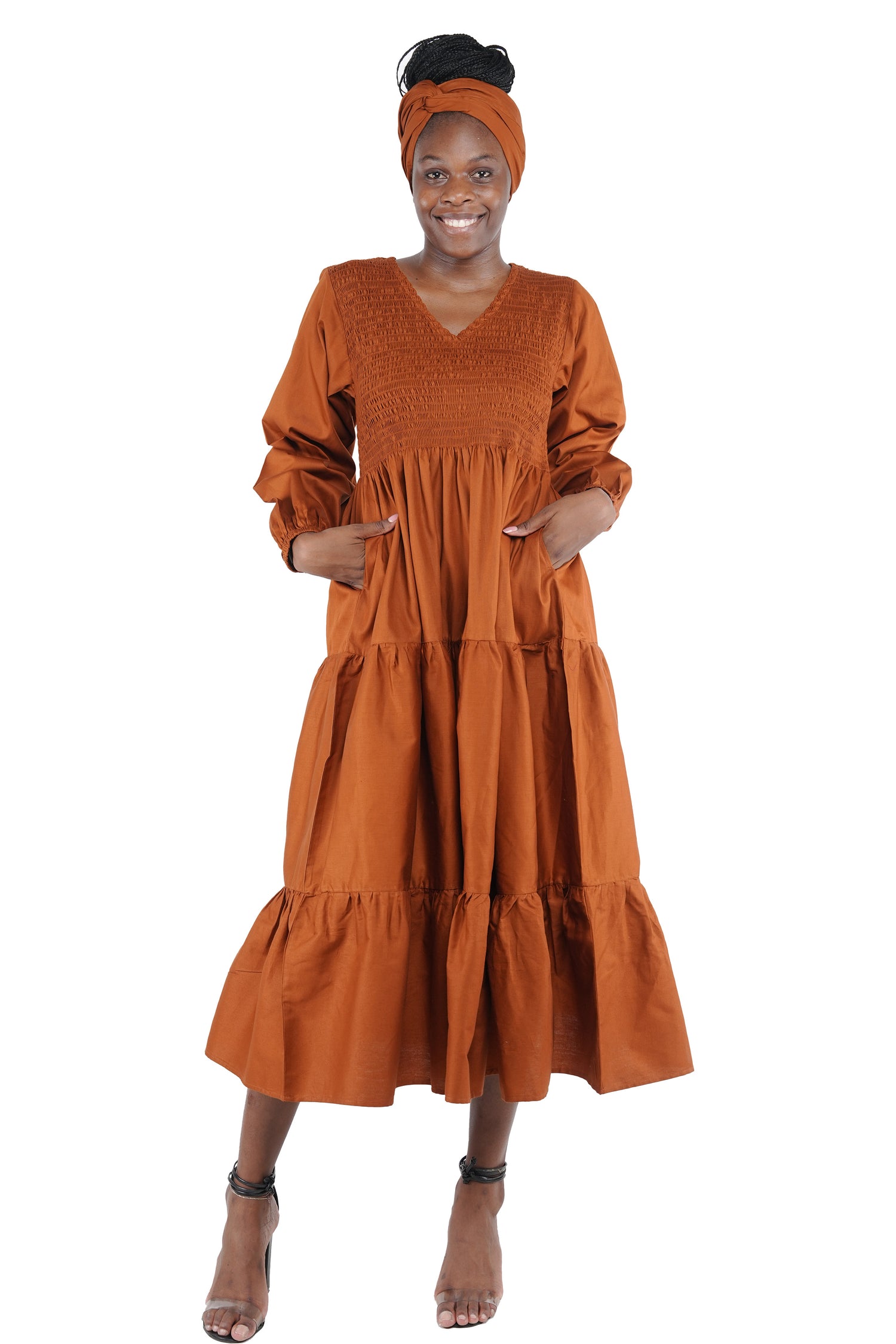 African smocked maxi tiered dress with long sleeves and headwrap
Cotton V-neck African maxi dress with pockets
Afrocentric long sleeve tiered dress one size fits most
African dresses for women