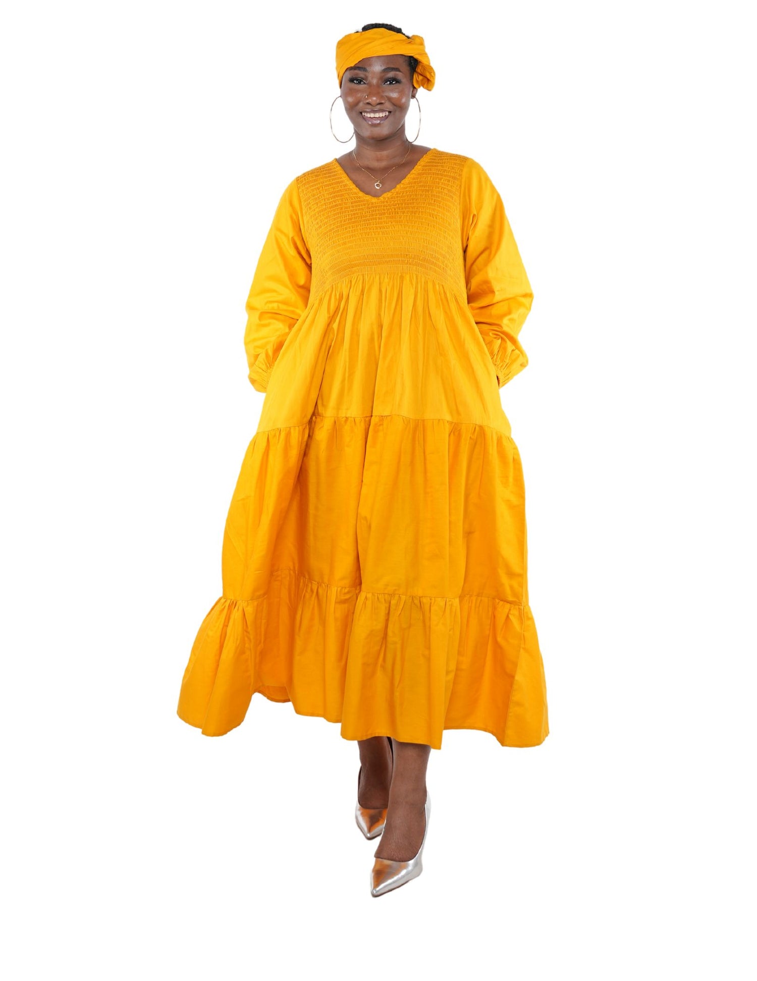 African smocked maxi tiered dress with long sleeves and headwrap
Cotton V-neck African maxi dress with pockets
Afrocentric long sleeve tiered dress one size fits most
African dresses for women