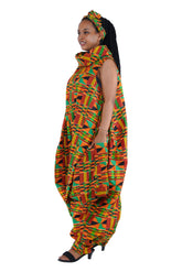 Elegant African woman wearing long high neck jumpsuit with matching headwrap in traditional print – 100% cotton, includes side pockets.