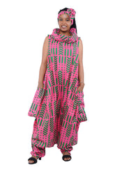 Elegant African woman wearing long high neck jumpsuit with matching headwrap in traditional print – 100% cotton, includes side pockets.