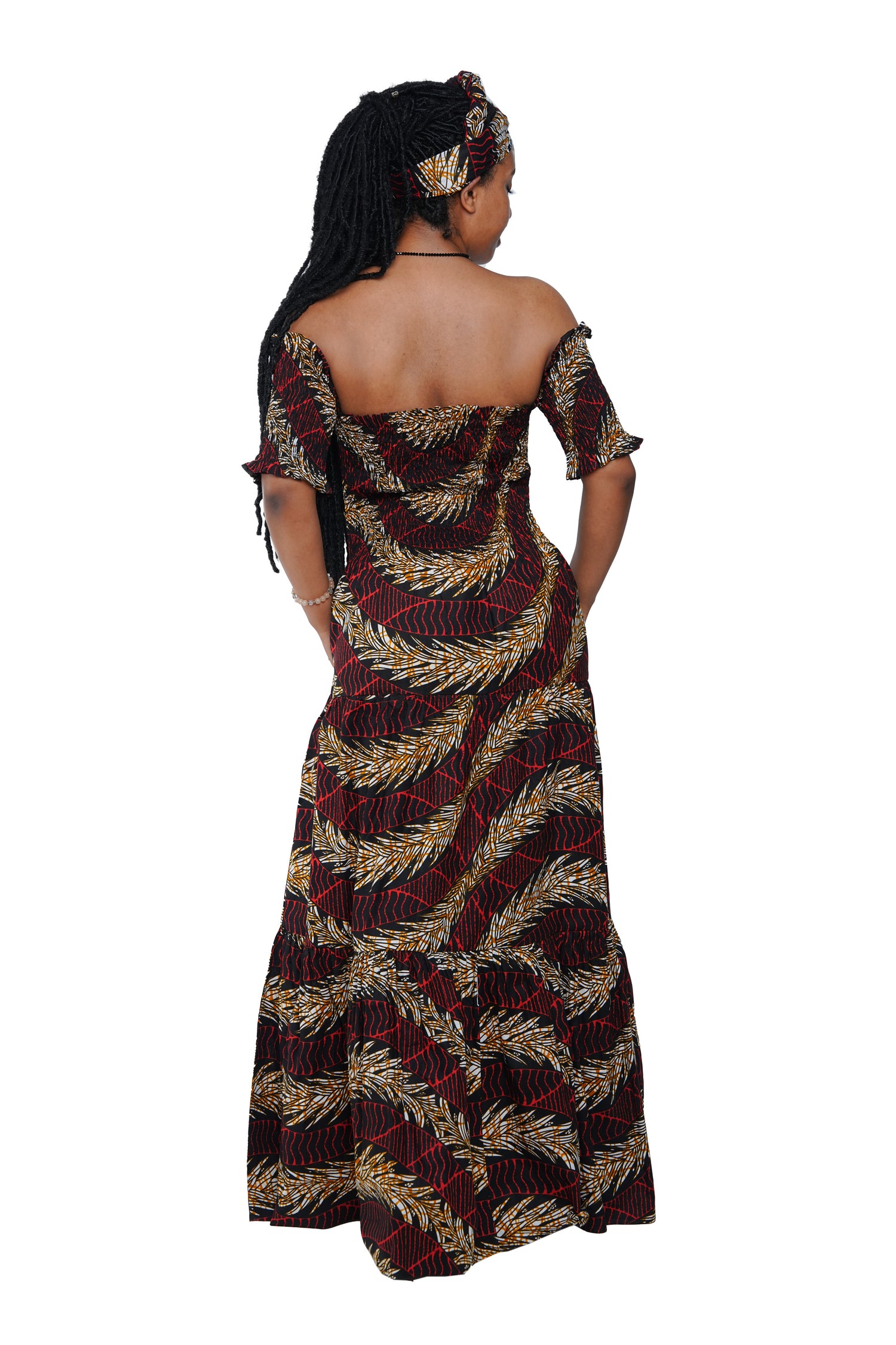 Back view of smocked bodice off shoulder African print dress”