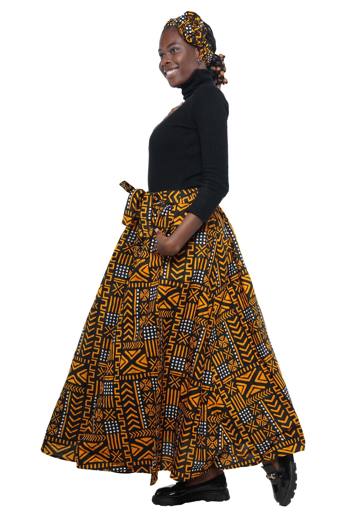 Side view of African print 41-inch maxi skirt showing pockets and eight-panel design