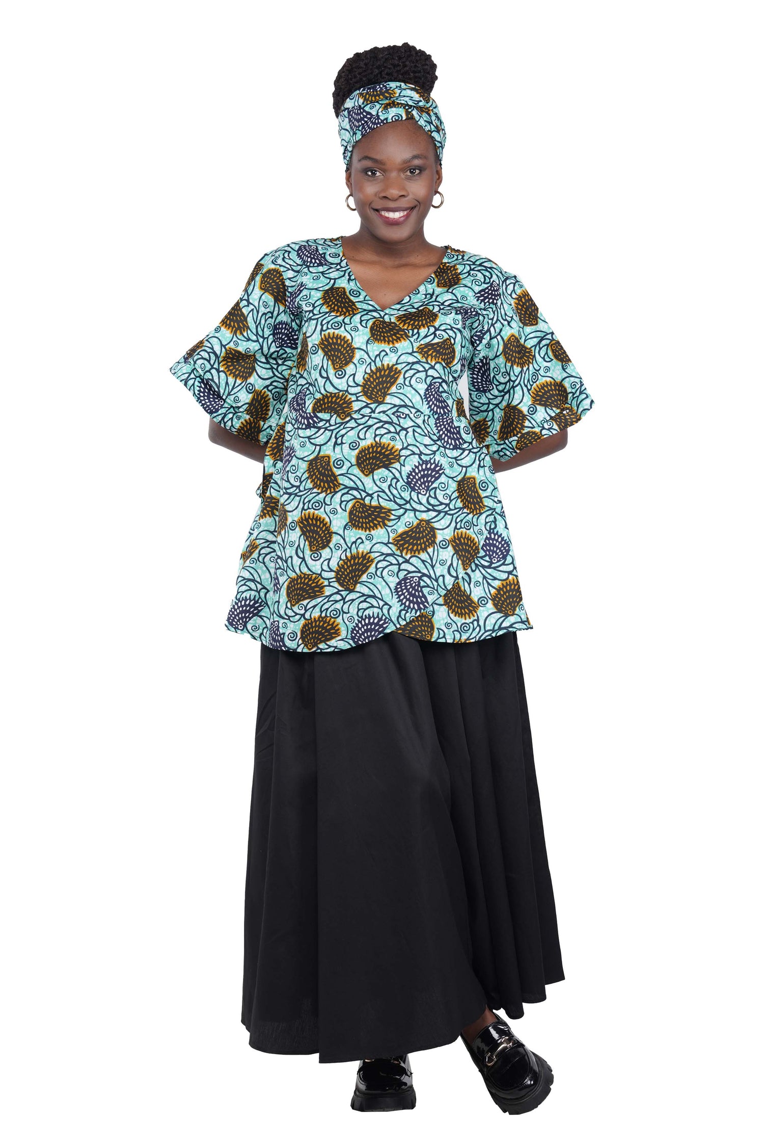 Woman wearing African print wrap top with 3/4 sleeves double layered – cotton, one size,  – Ankara inspired