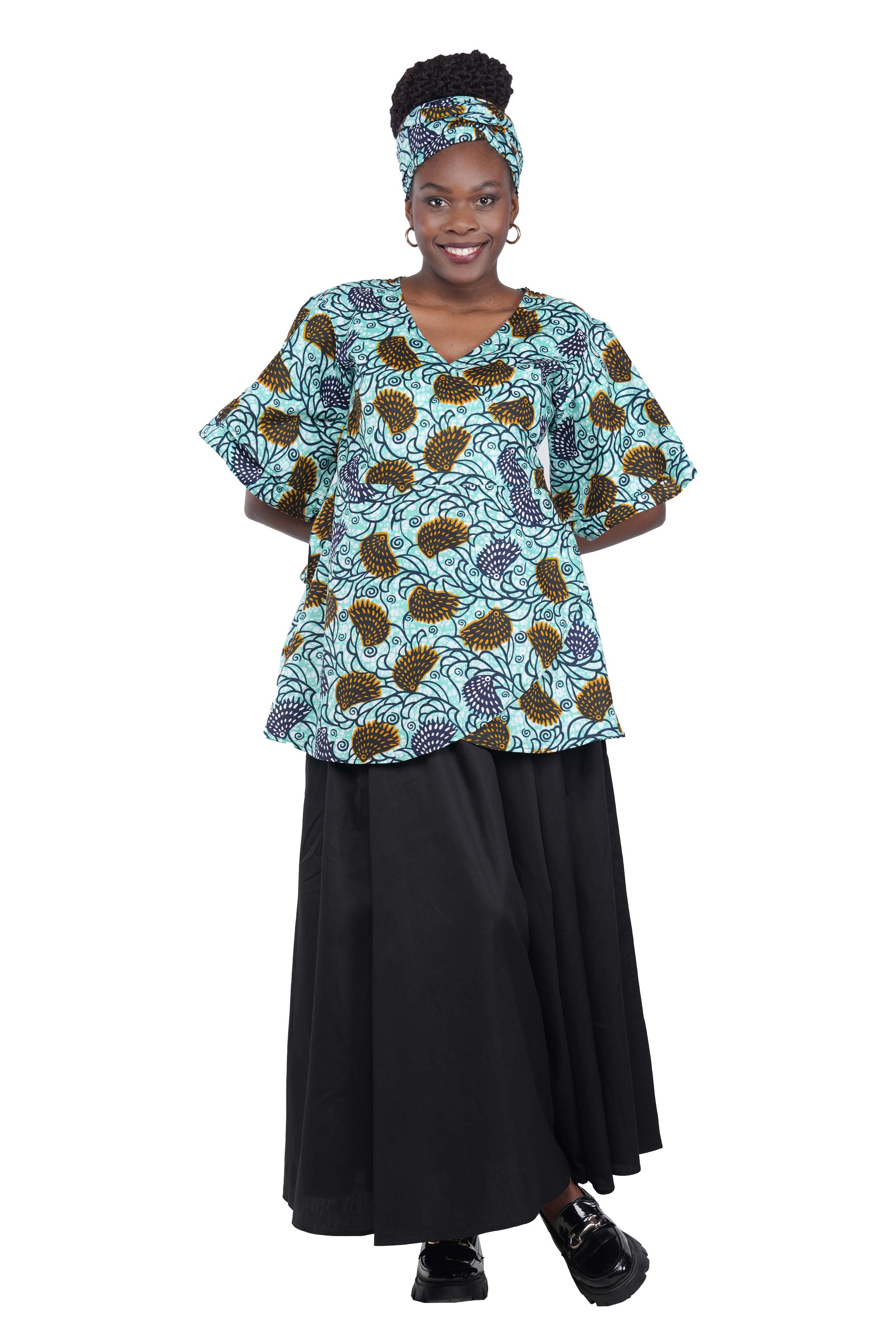 Woman wearing African print wrap top with 3/4 sleeves double layered – cotton, one size,  – Ankara inspired
