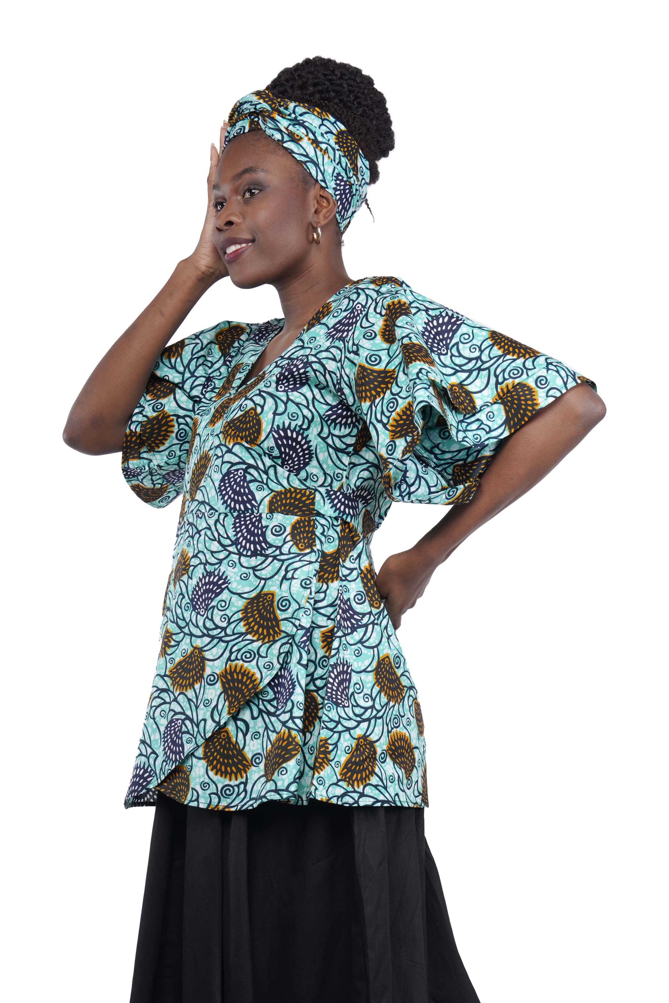 Woman wearing African print wrap top with 3/4 sleeves double layered – cotton, one size,  – Ankara inspired