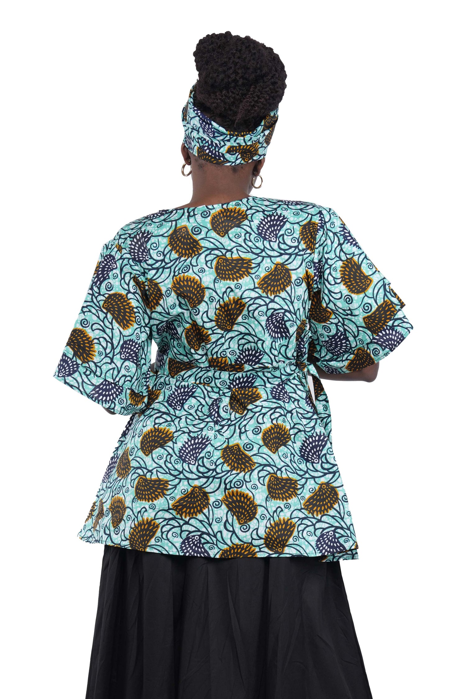 Woman wearing African print wrap top with 3/4 sleeves double layered – cotton, one size,  – Ankara inspired