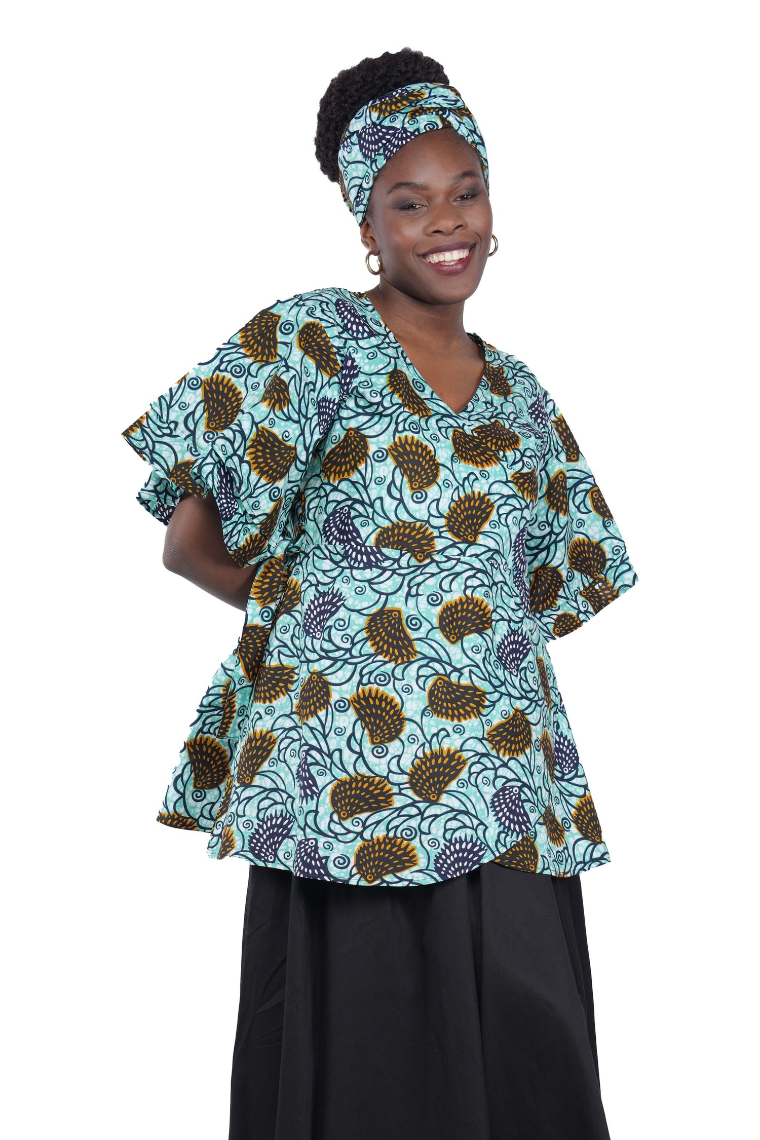 Woman wearing African print wrap top with 3/4 sleeves double layered – cotton, one size,  – Ankara inspired