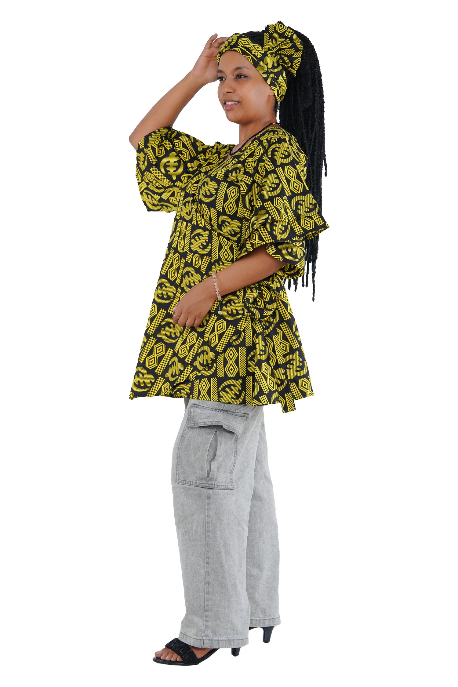 Woman wearing African print wrap top with 3/4 sleeves double layered – cotton, one size,  – Ankara inspired