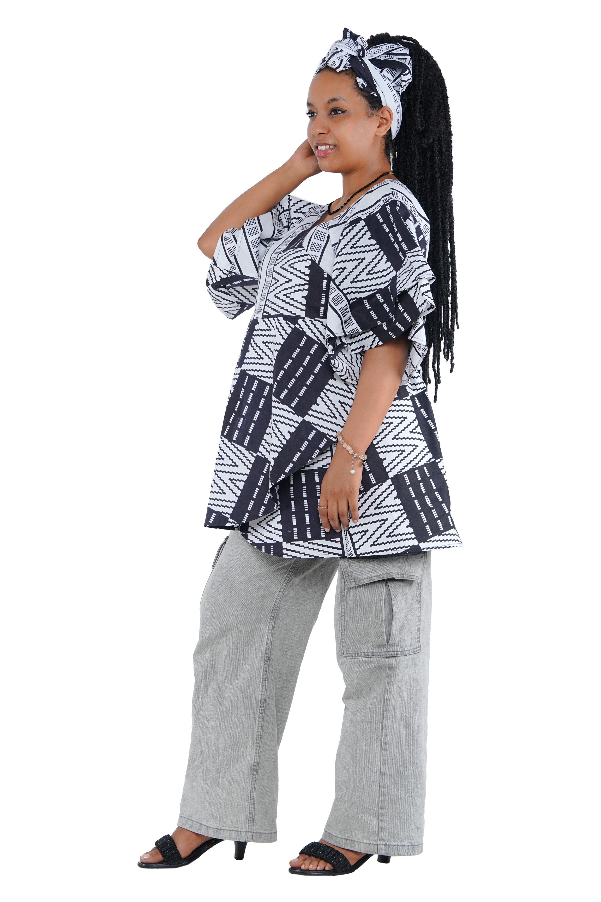 Woman wearing African print wrap top with 3/4 sleeves double layered – cotton, one size,  – Ankara inspired