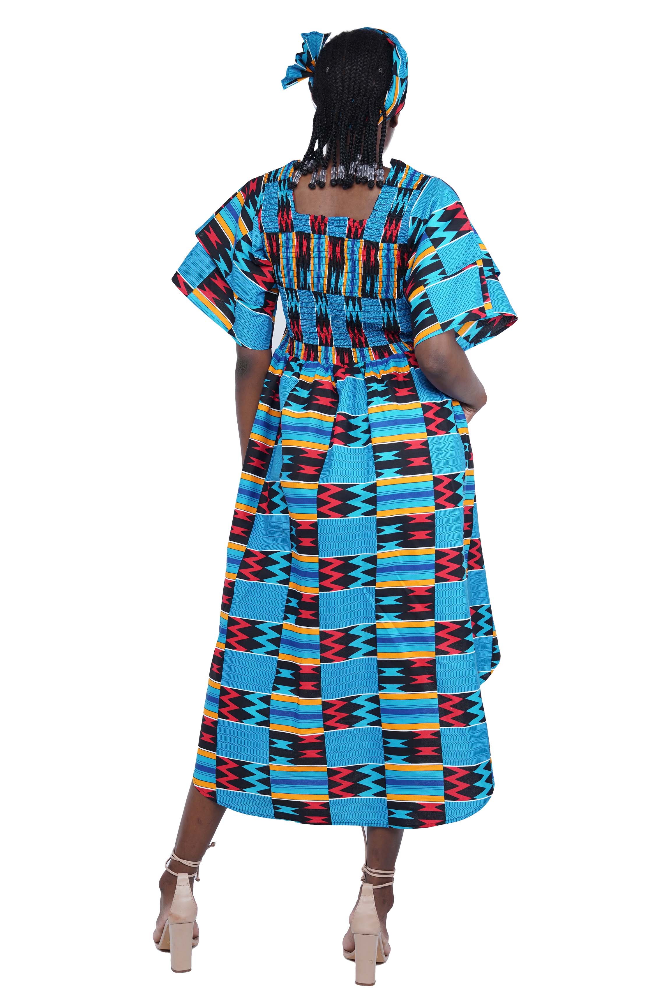 African smocked high low dress with headwrap and pockets
Afrocentric cotton dress with double layer hem and V neckline
High low African dress one size fits most
African dresses for women