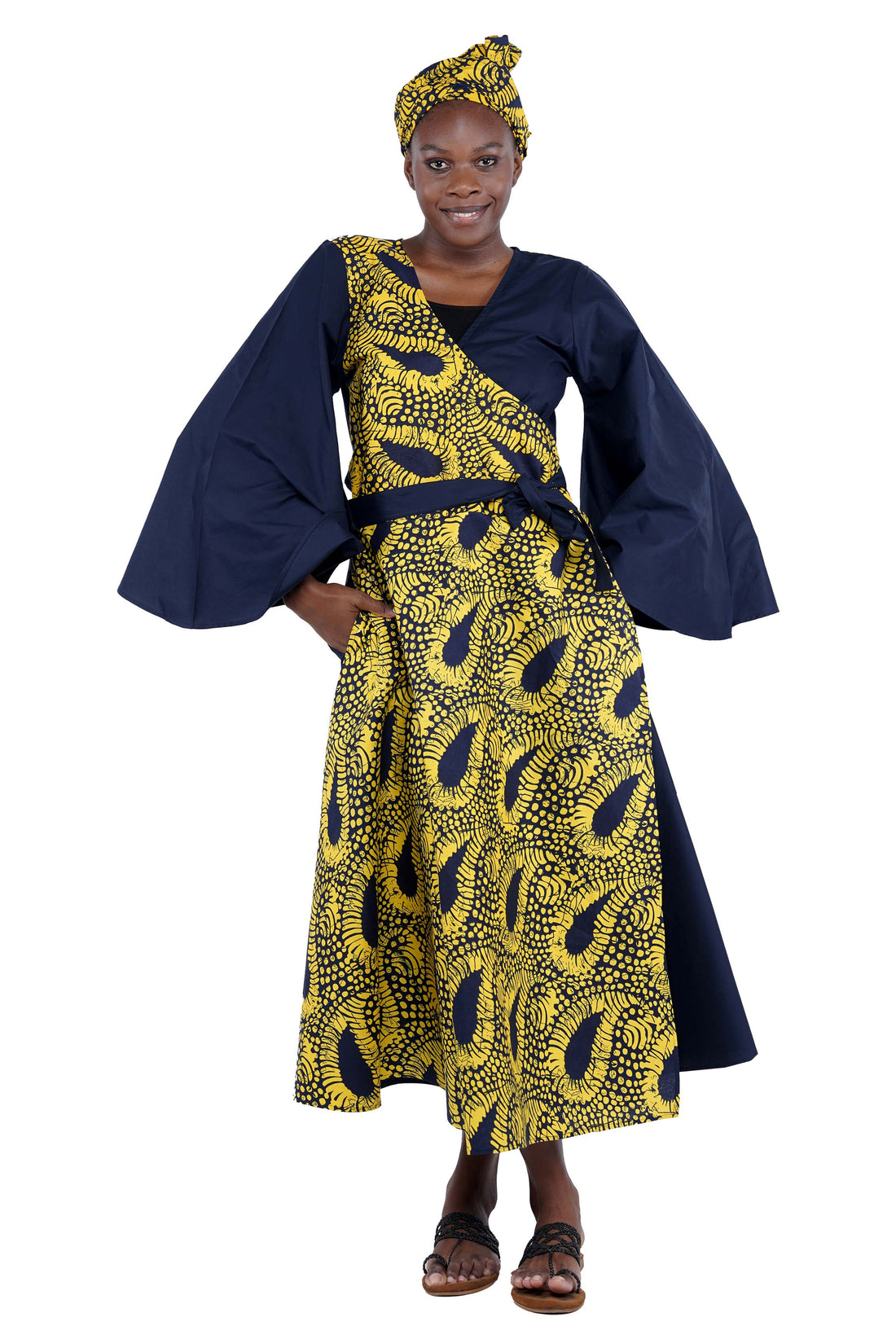 African long wrap dress with pockets and matching headwrap

Afrocentric cotton wrap dress with tribal print

African attire for women – ankara wrap dress

African dresses for women