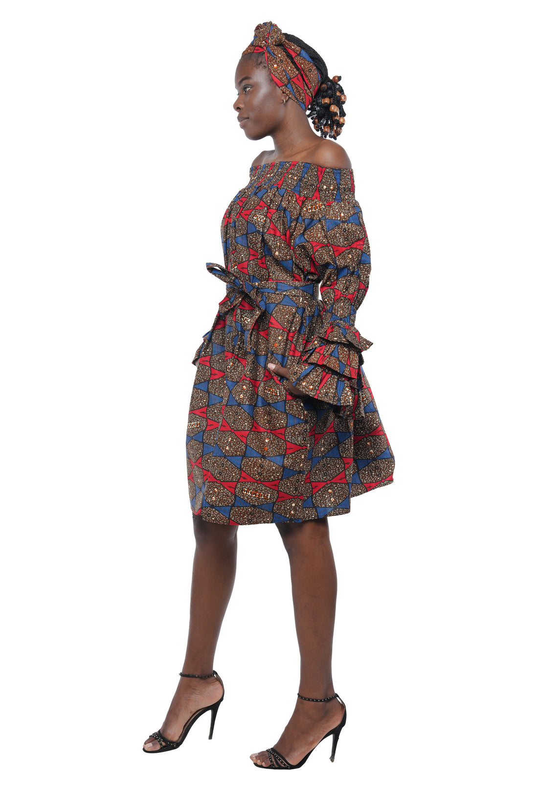 African off-the-shoulder midi dress with belt and headwrap
Afrocentric cotton midi dress with pockets
African attire for women – tribal print midi dress
African dresses for women