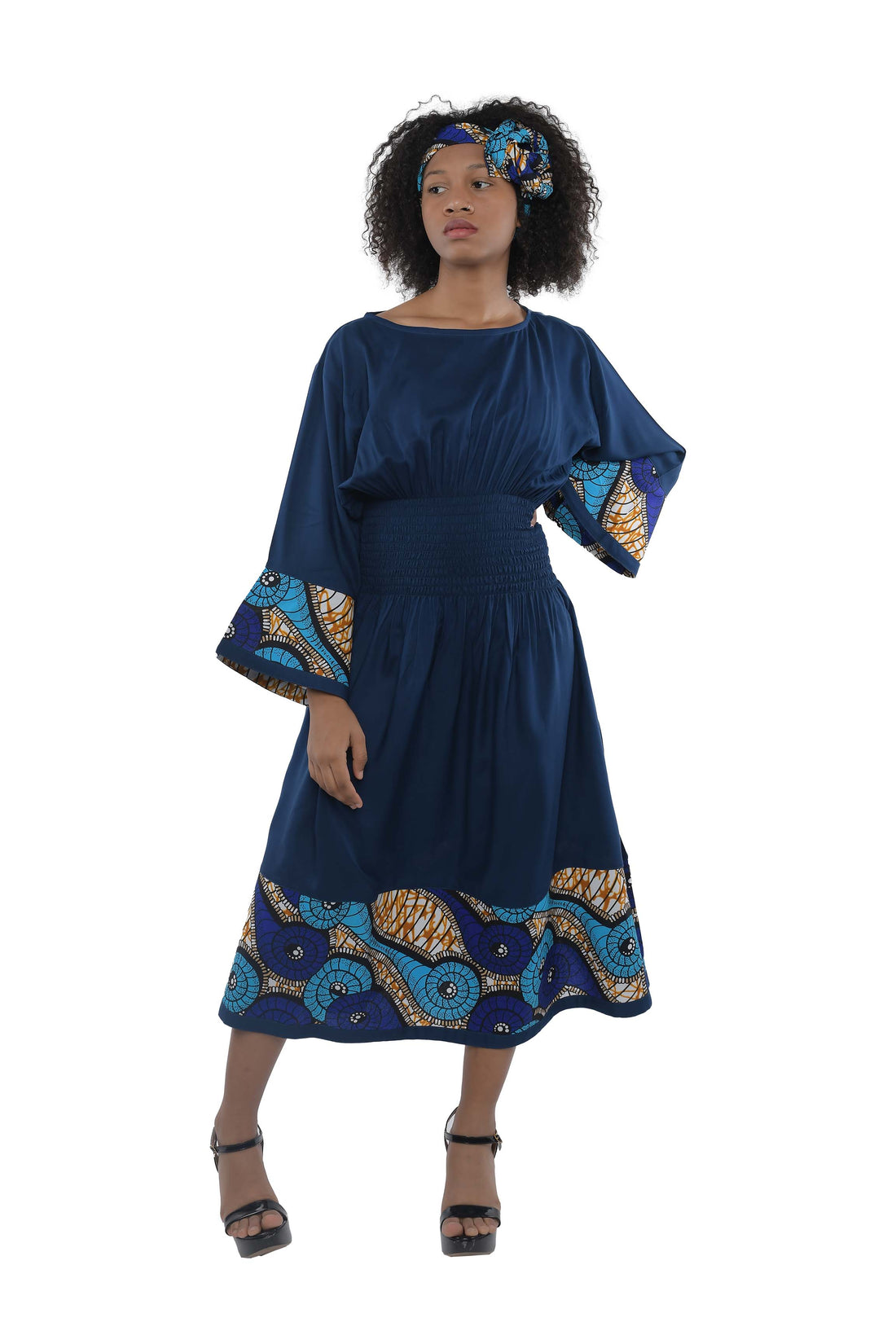 African trim midi dress in solid color with patchwork detail

Afrocentric rayon dress with smocked waist and headwrap

African print patchwork midi dress with pockets

African dresses for women

