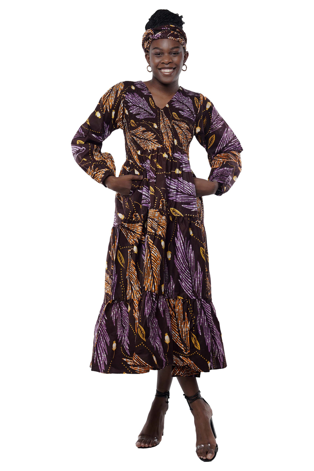 African smocked maxi tiered dress with long sleeves and headwrap
Cotton V-neck African maxi dress with pockets
Afrocentric long sleeve tiered dress one size fits most
African dresses for women