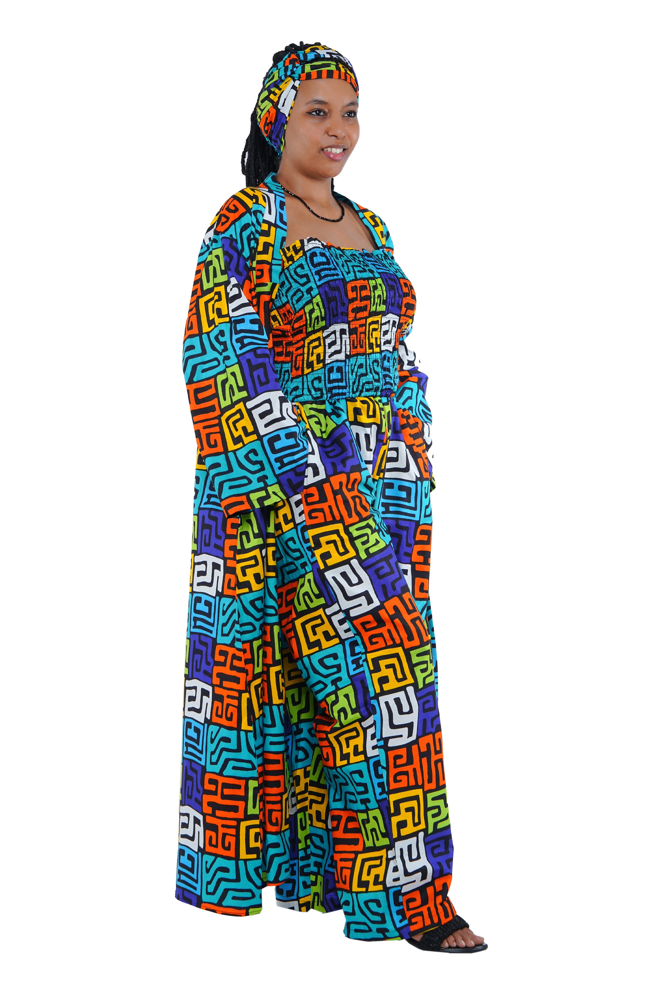 Model wearing African 3-piece cotton outfit with kimono and head wrap