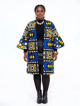 Side view of African Ankara reversible jacket with matching two-sided belt