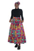 Woman wearing African print long maxi skirt in bold Ankara fabric, styled for cultural events, weddings, or everyday elegance.