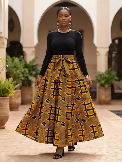 Close-up of elasticated waistband and attached pair of belts on African print cotton maxi skirt