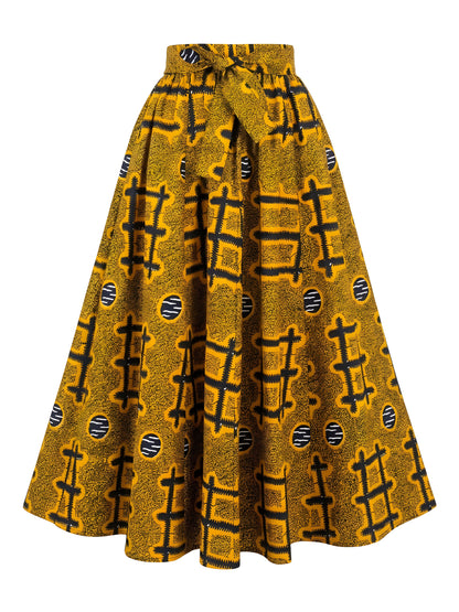 Model wearing African print maxi skirt with matching headwrap styled with a coordinating top