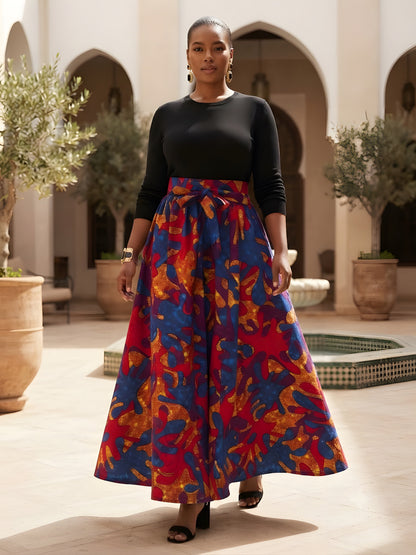 Close-up of elasticated waistband and attached pair of belts on African print cotton maxi skirt